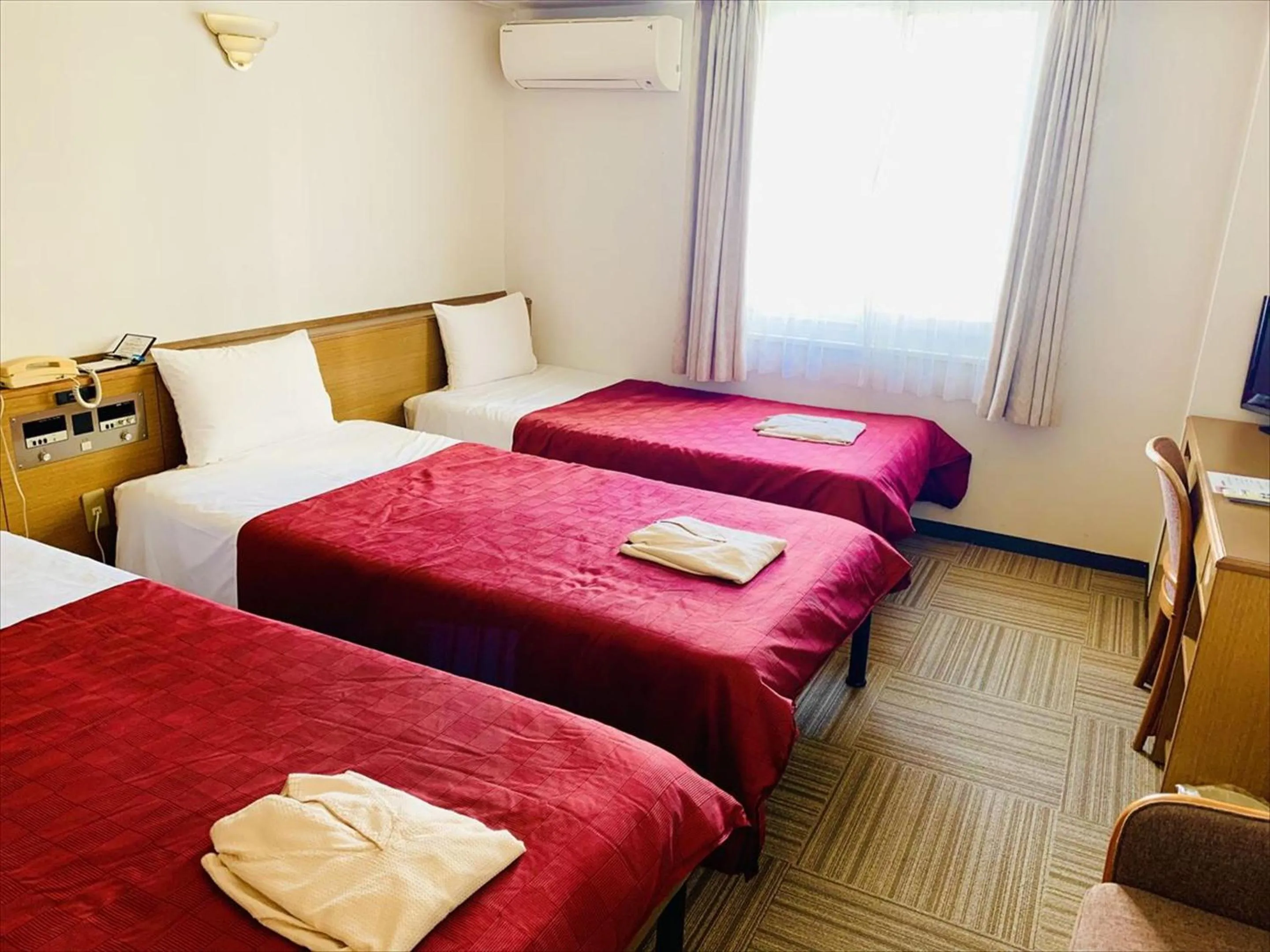 Bed in Okinawa Hotel