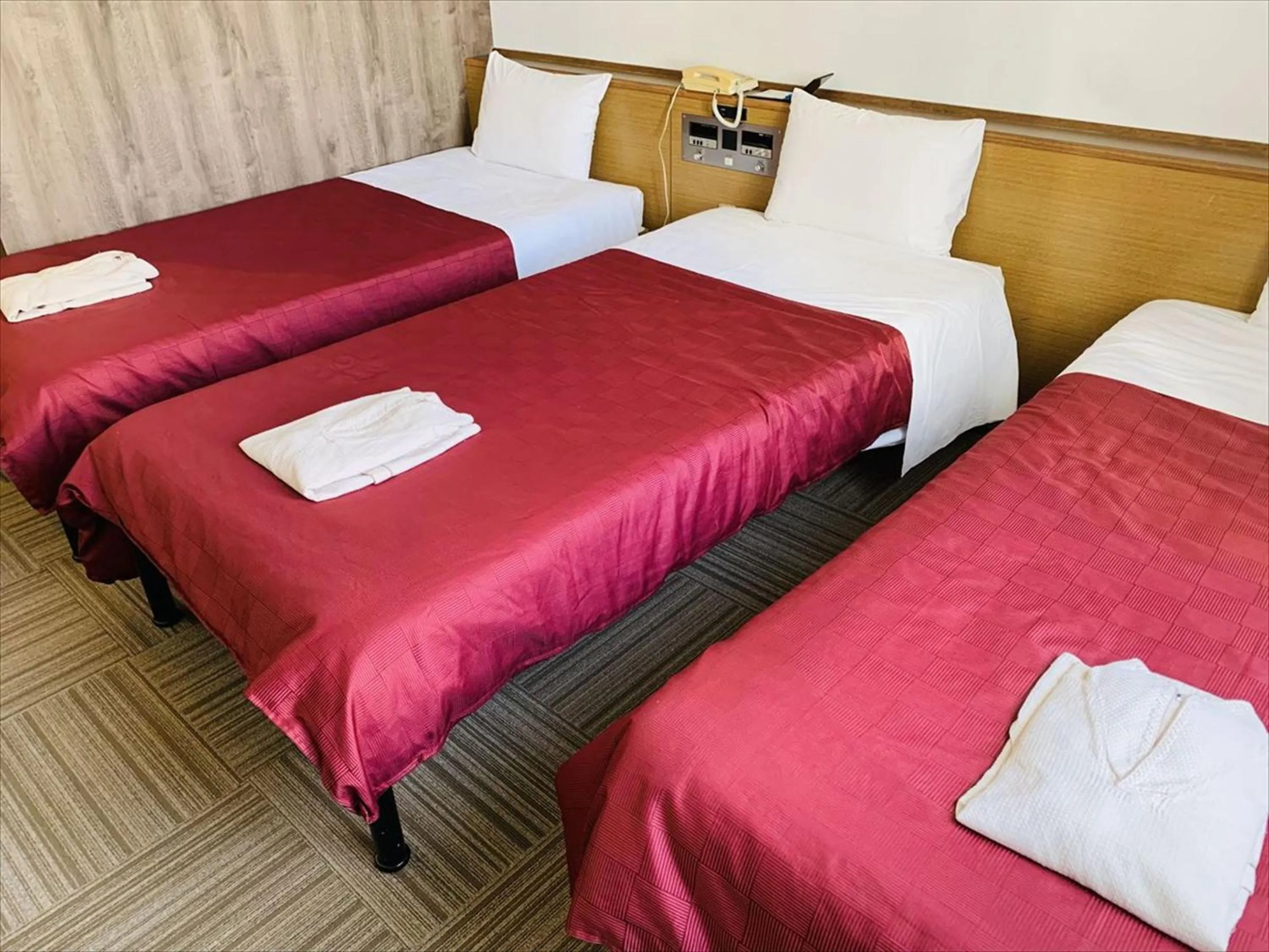 Bed in Okinawa Hotel