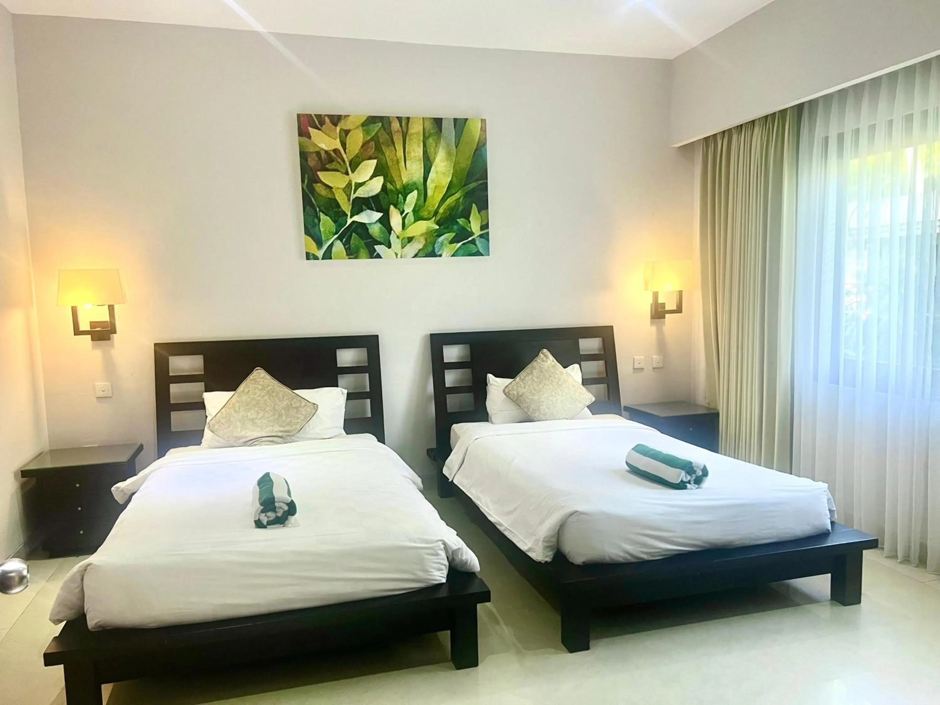 Bed in Peninsula Beach Resort