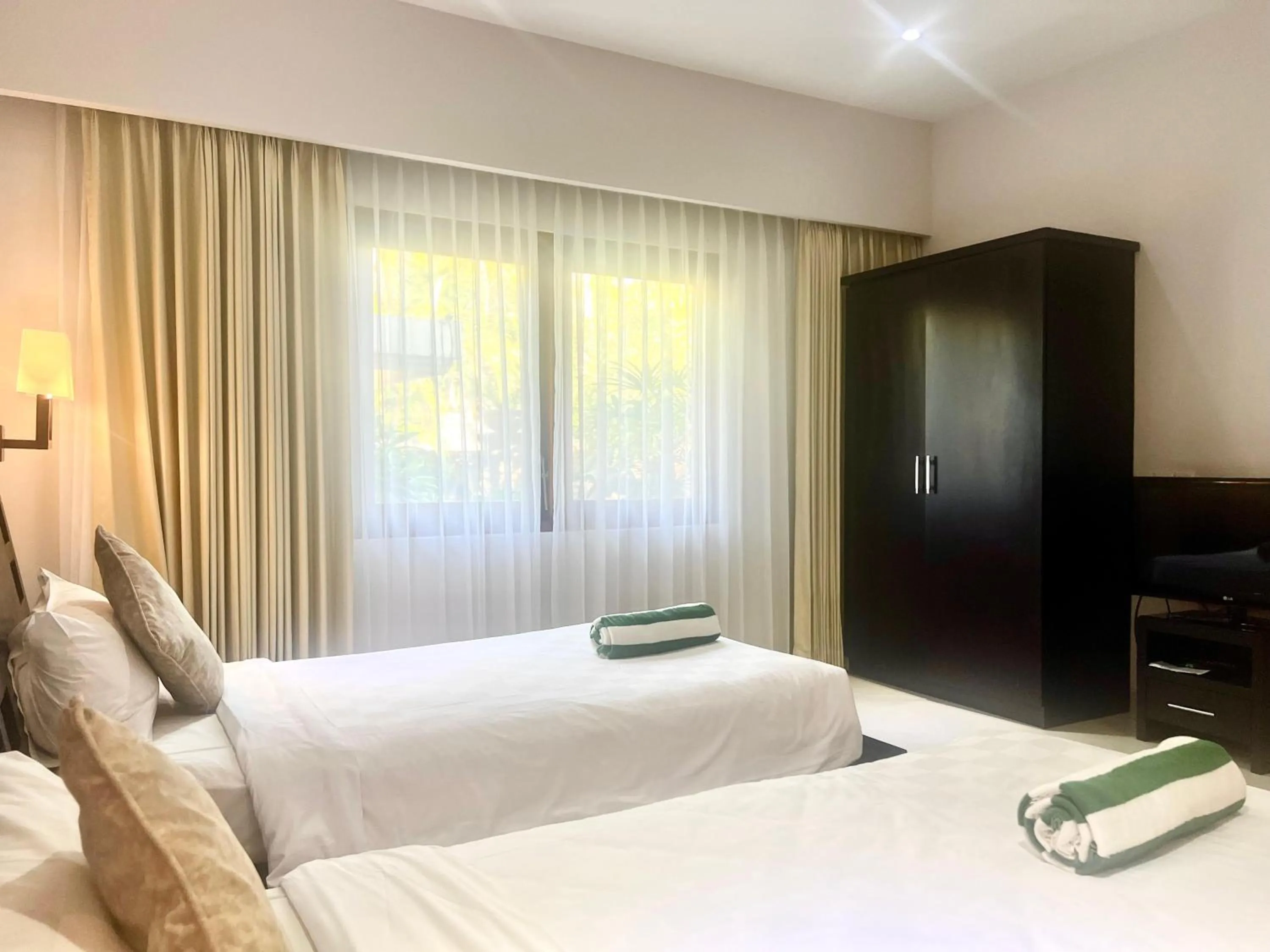 Bed in Peninsula Beach Resort