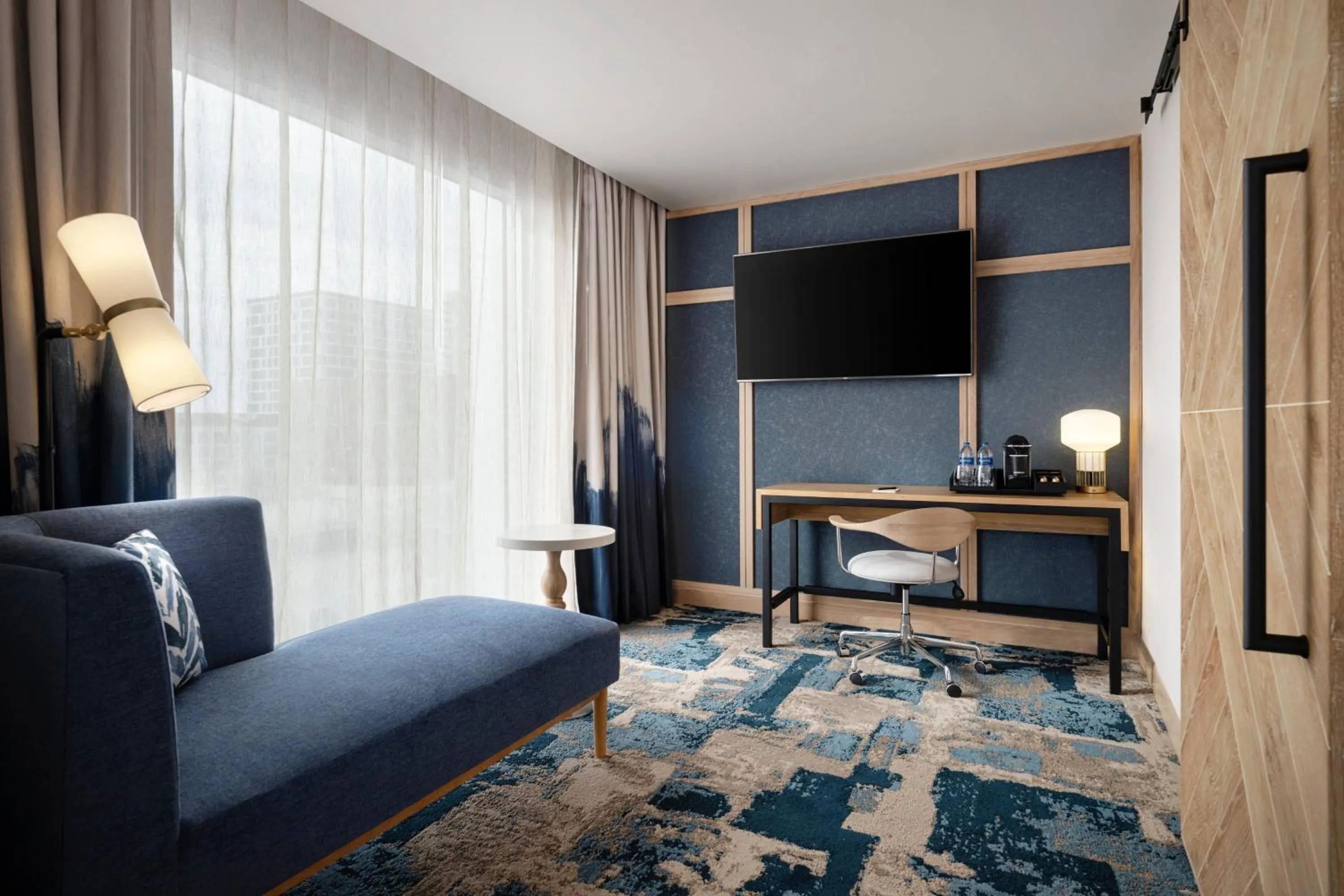 Living room in The Otis Hotel Austin, Autograph Collection