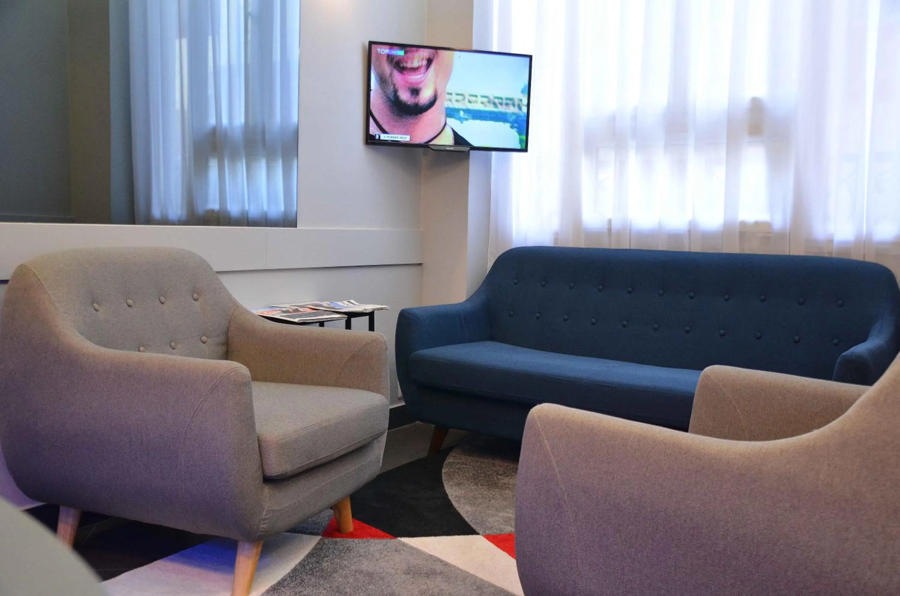 Communal lounge/ TV room, Seating Area in Ribera Eiffel