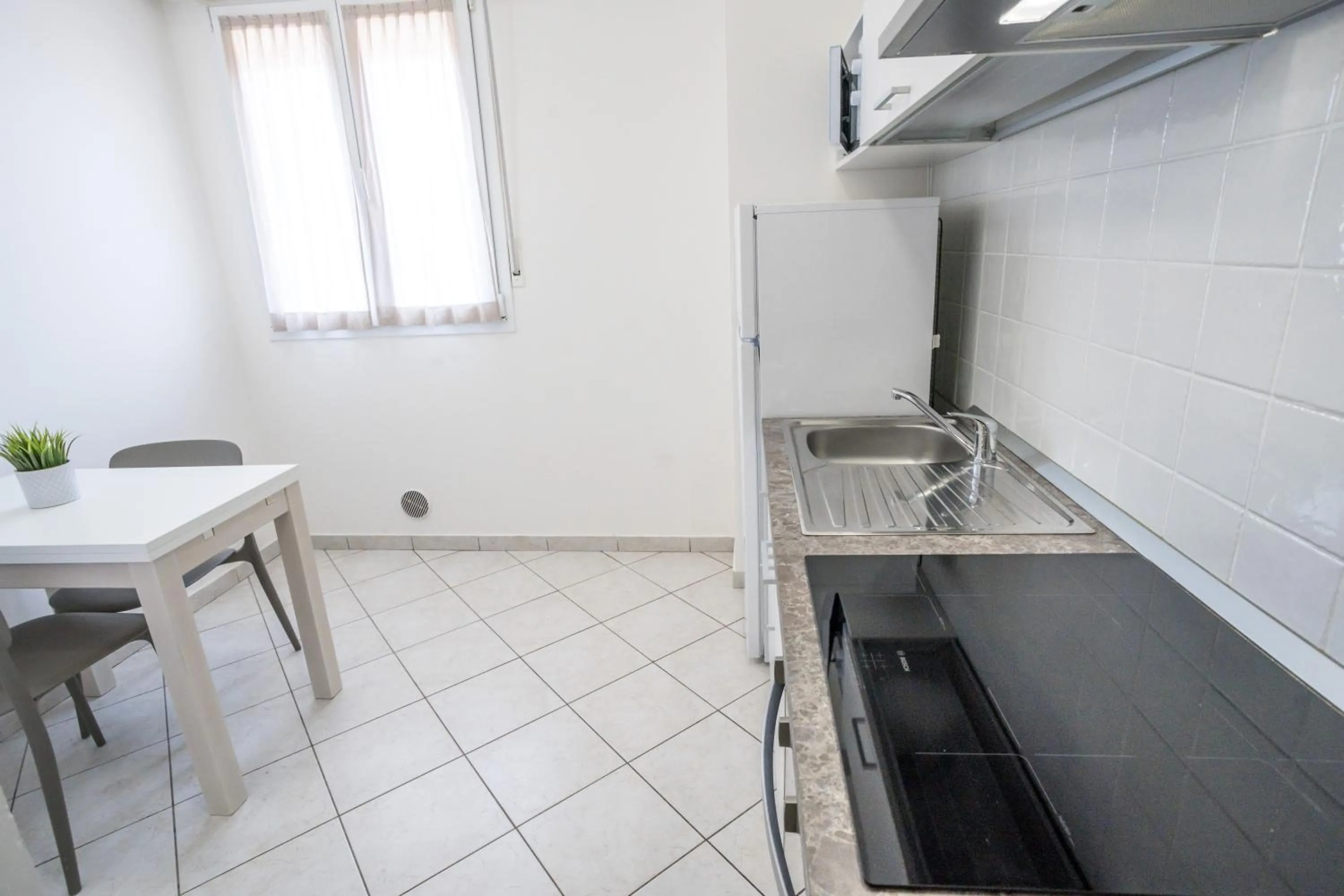 Kitchen or kitchenette in Rimini Bay Suites&Residence