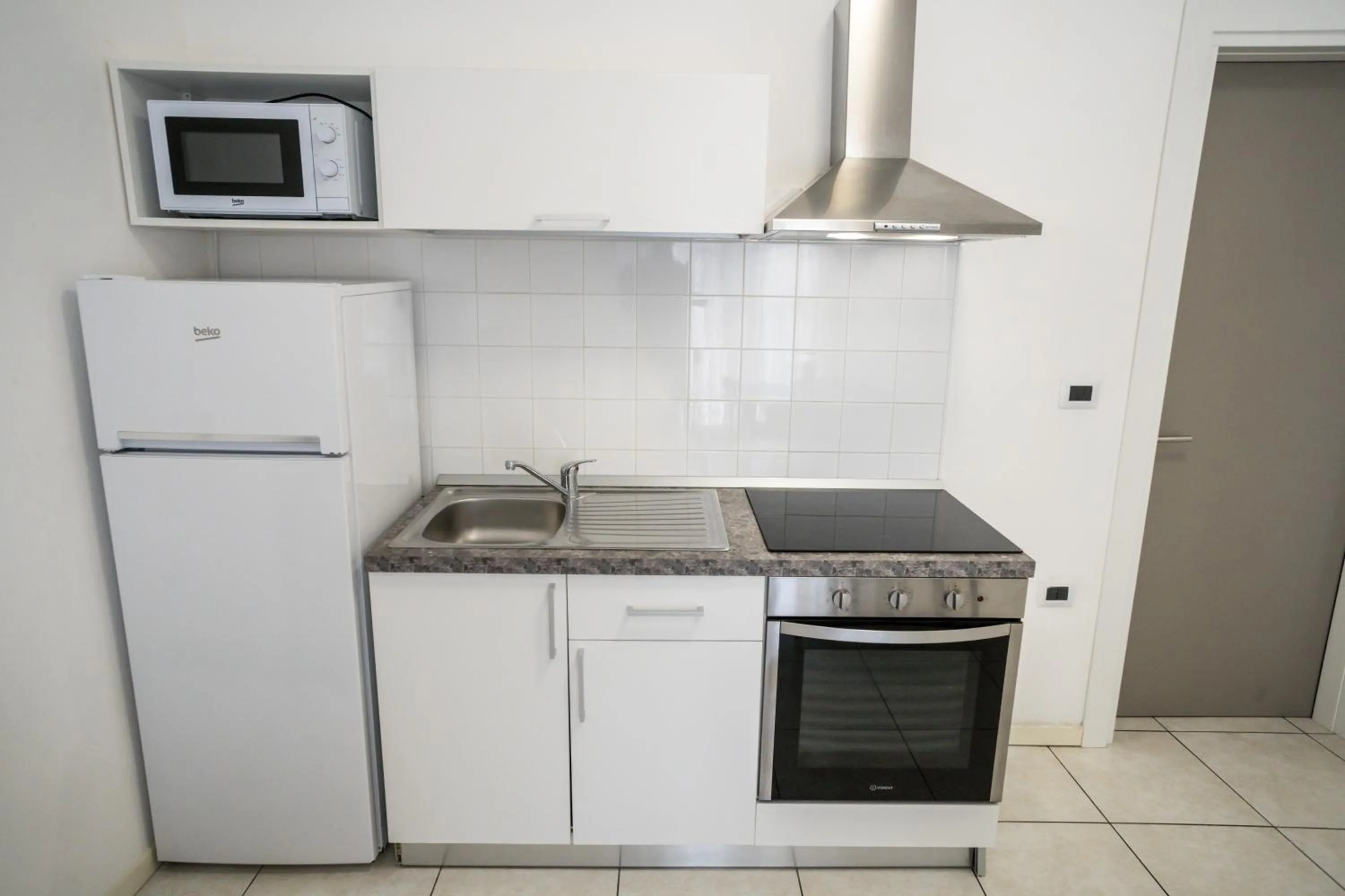 Kitchen or kitchenette in Rimini Bay Suites&Residence