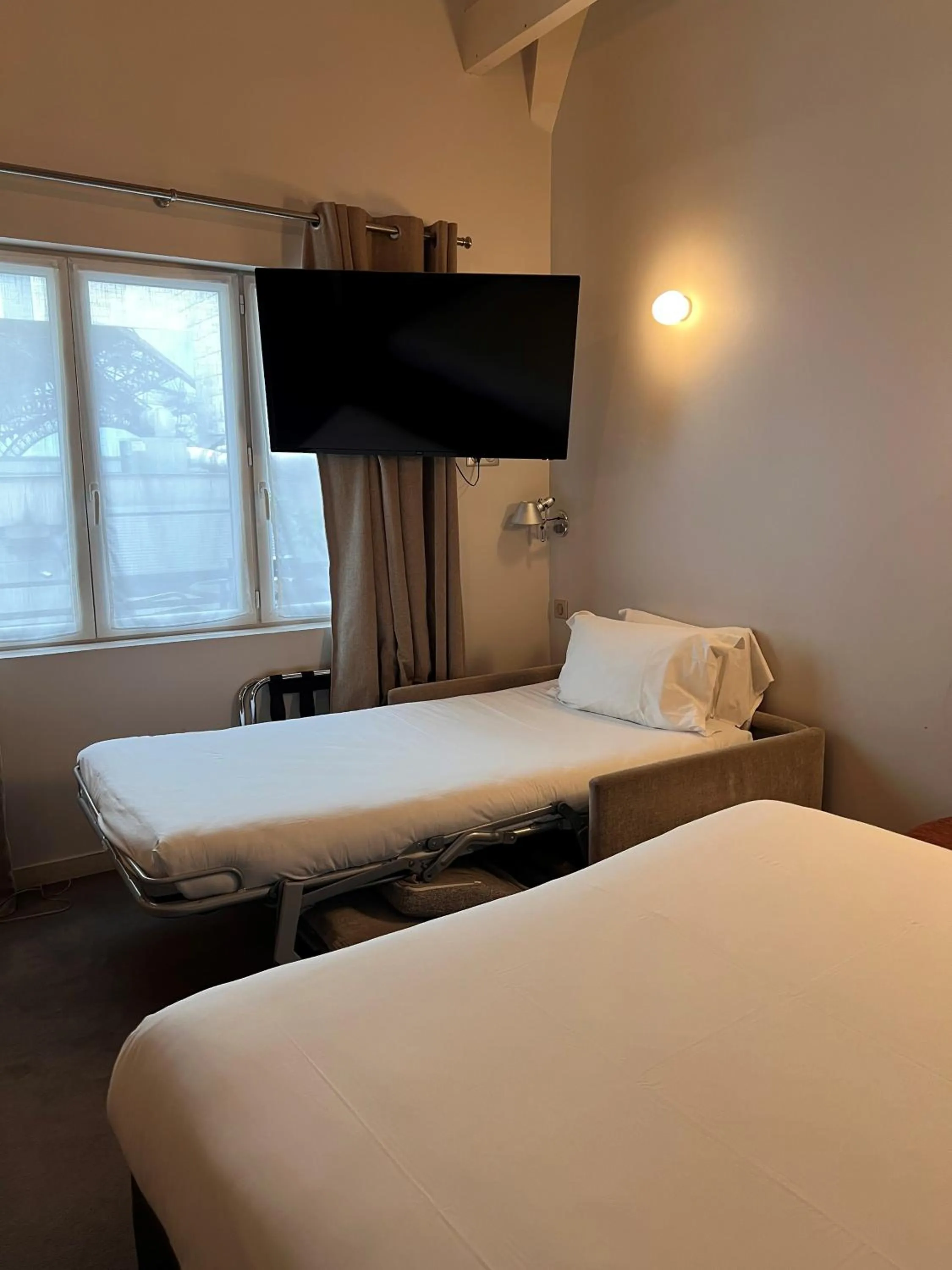 Bed in Hotel Du Cadran