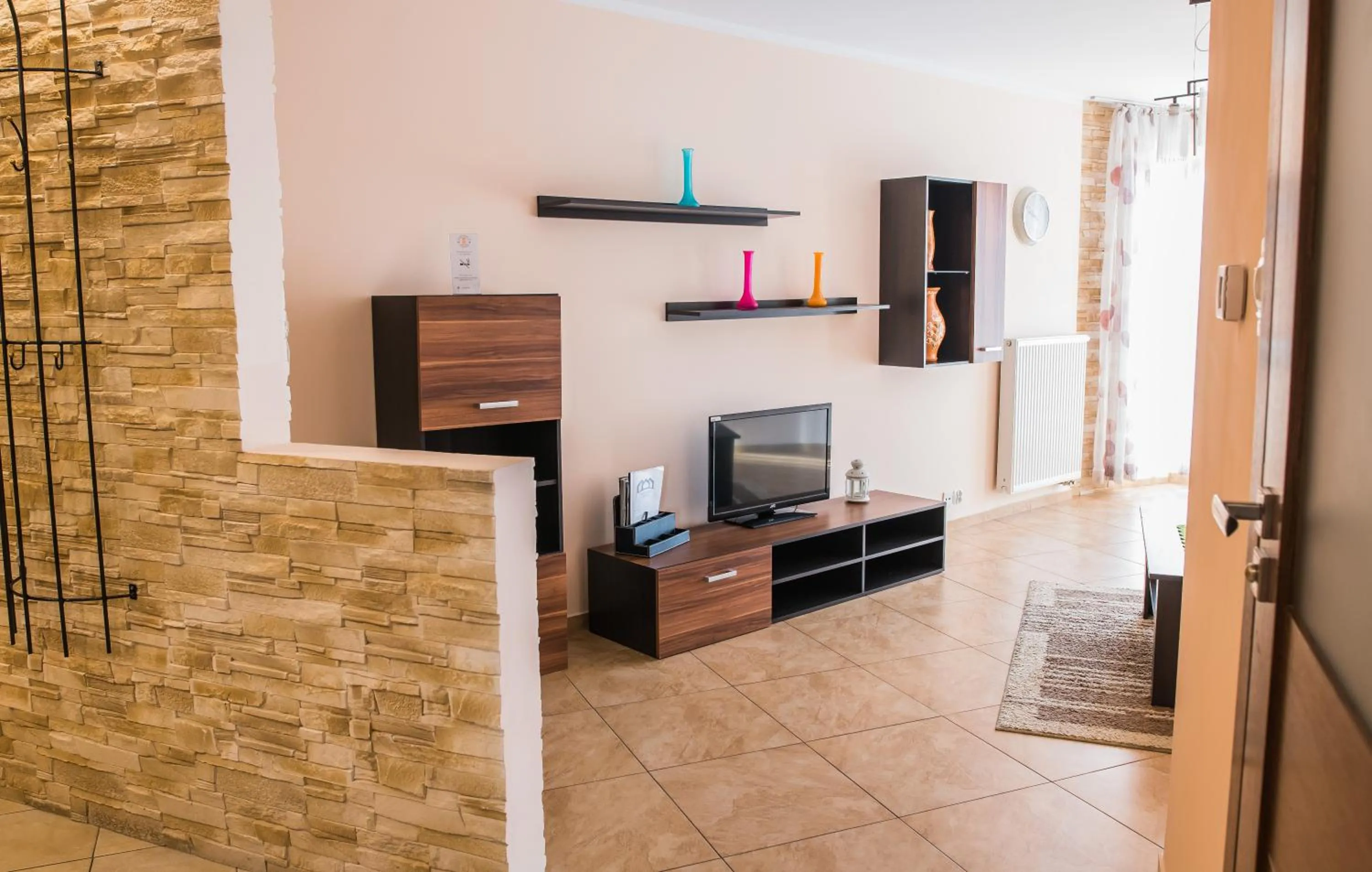 Communal lounge/ TV room in Apartamenty Centrum