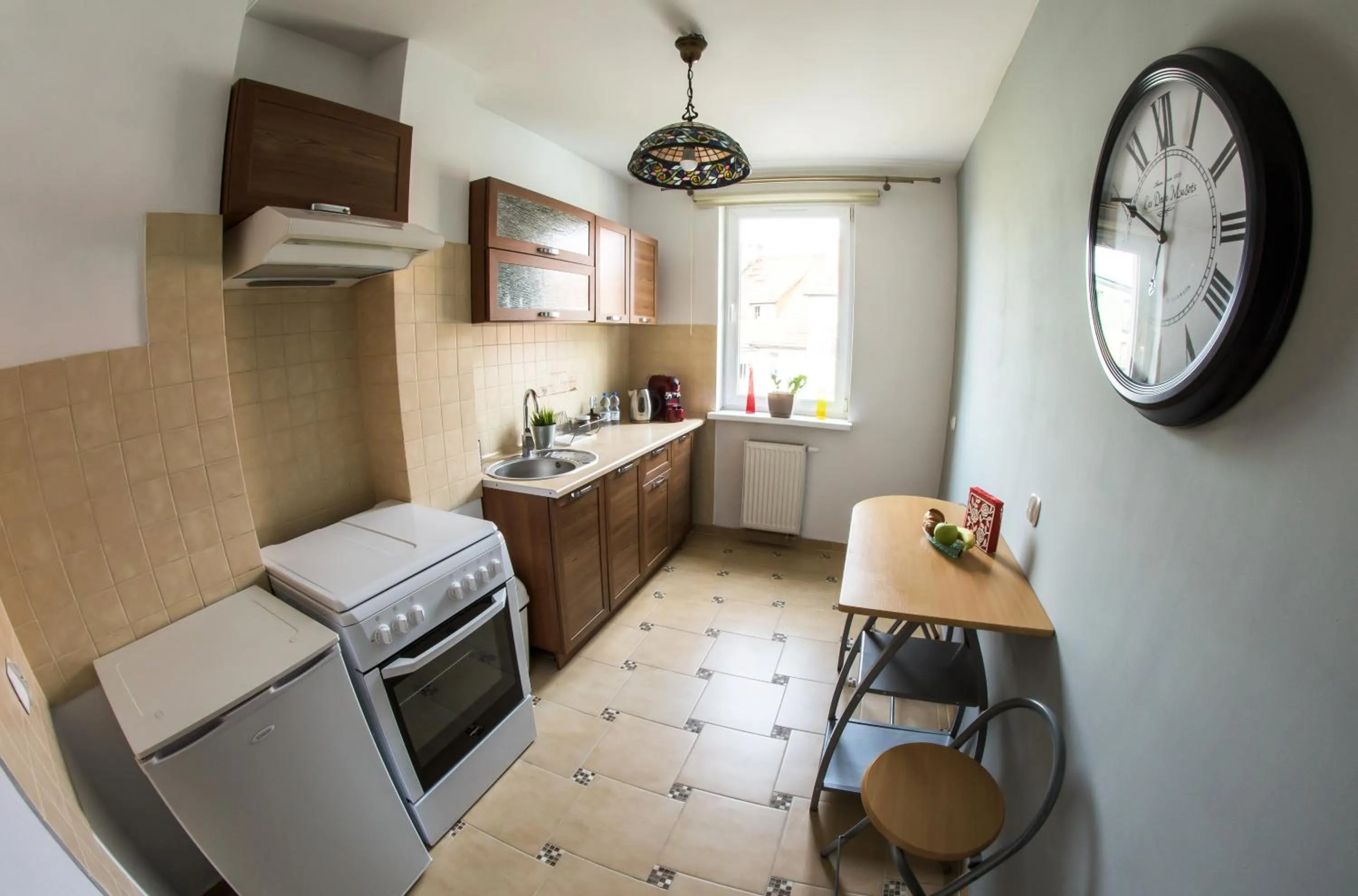 Kitchen or kitchenette in Apartamenty Centrum