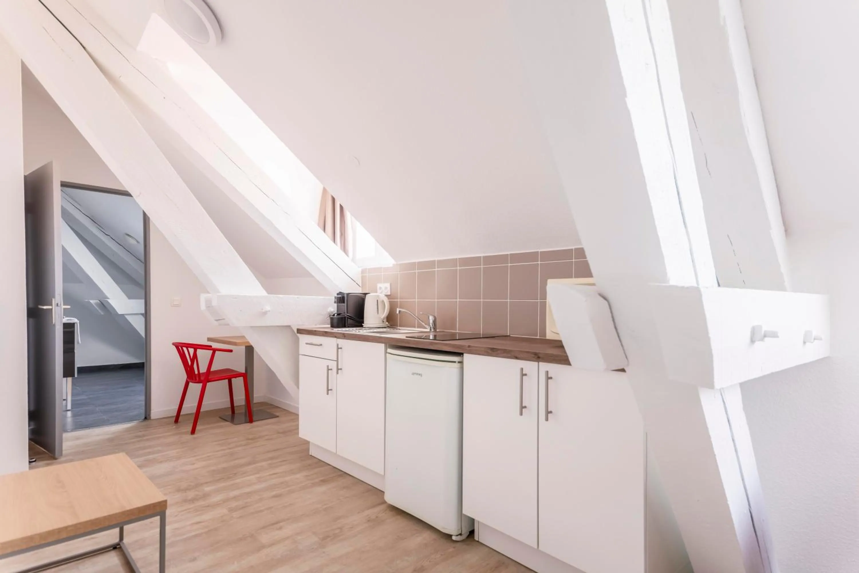 Kitchen or kitchenette in Residhotel Le Central'Gare