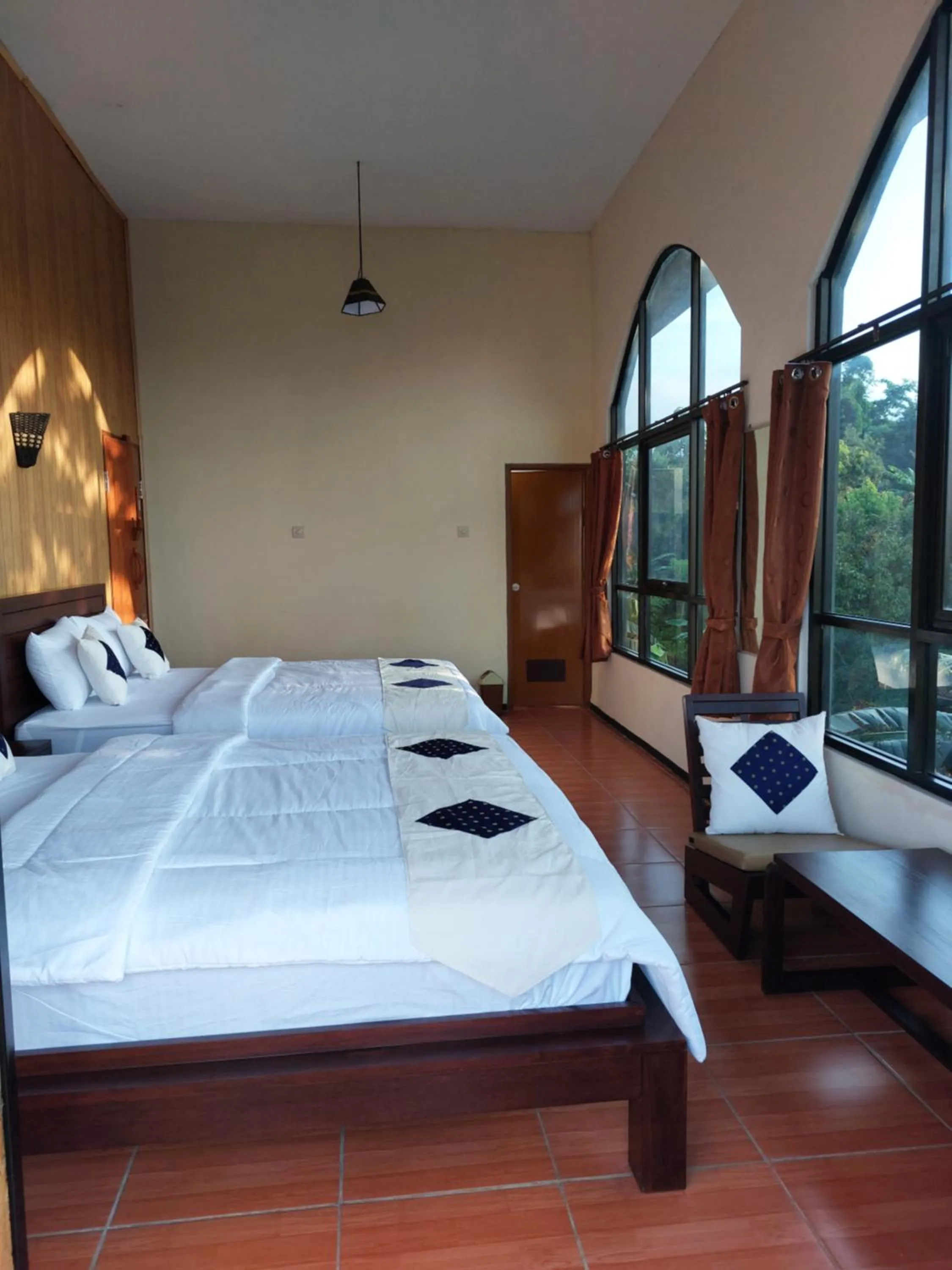 Bed in Bliss family cottage Batu