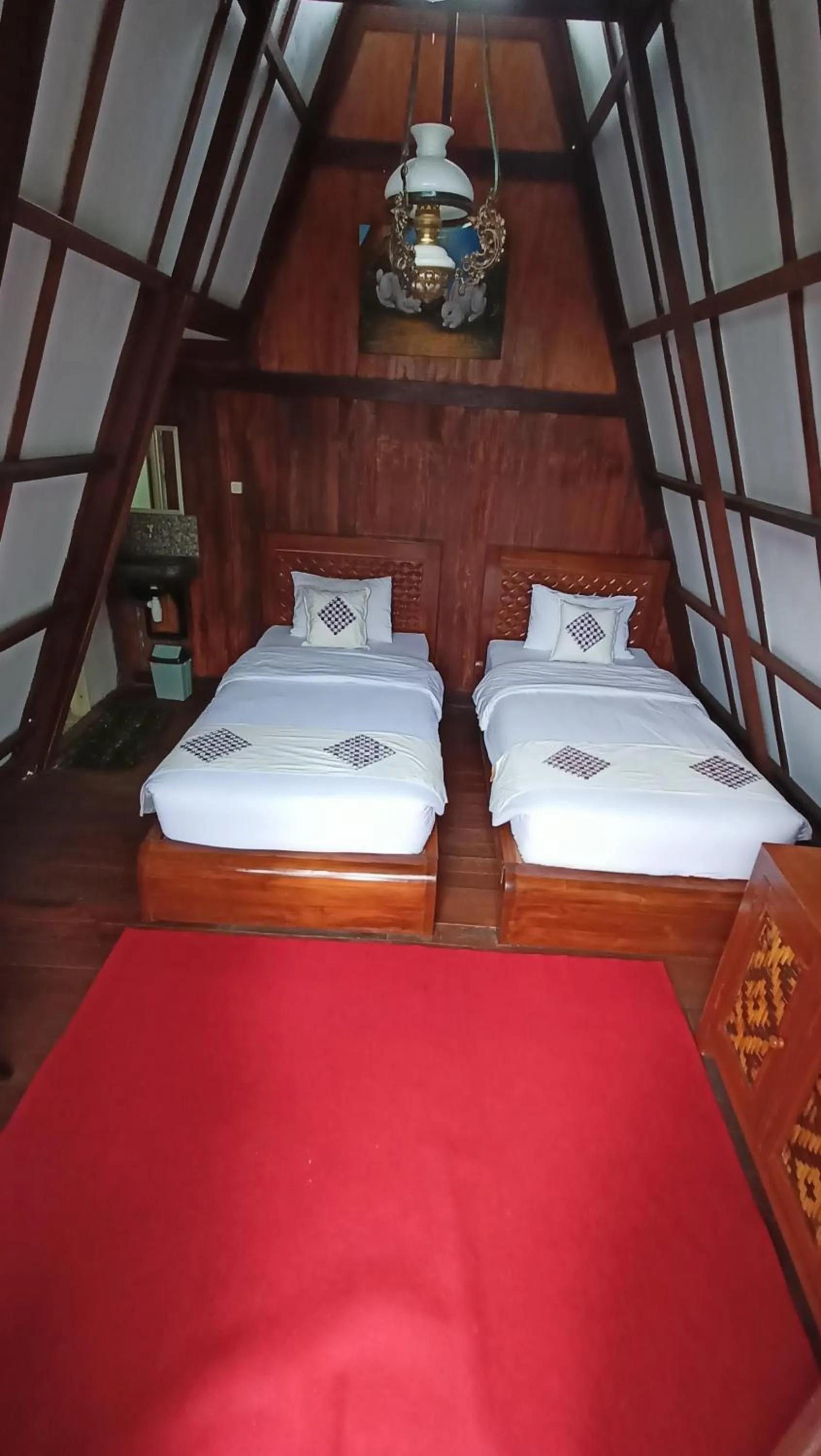 Bed in Bliss family cottage Batu