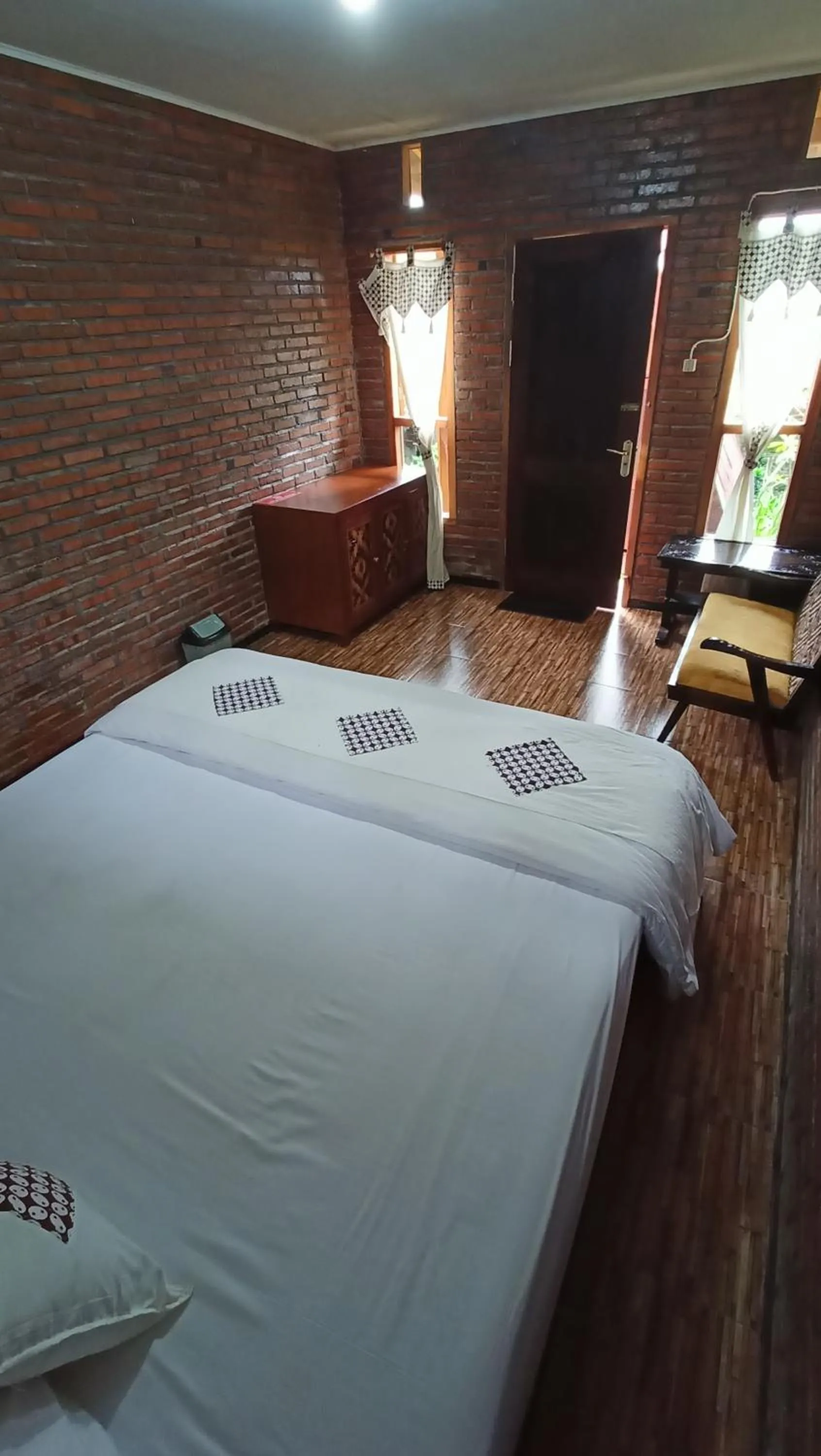 Bed in Bliss family cottage Batu
