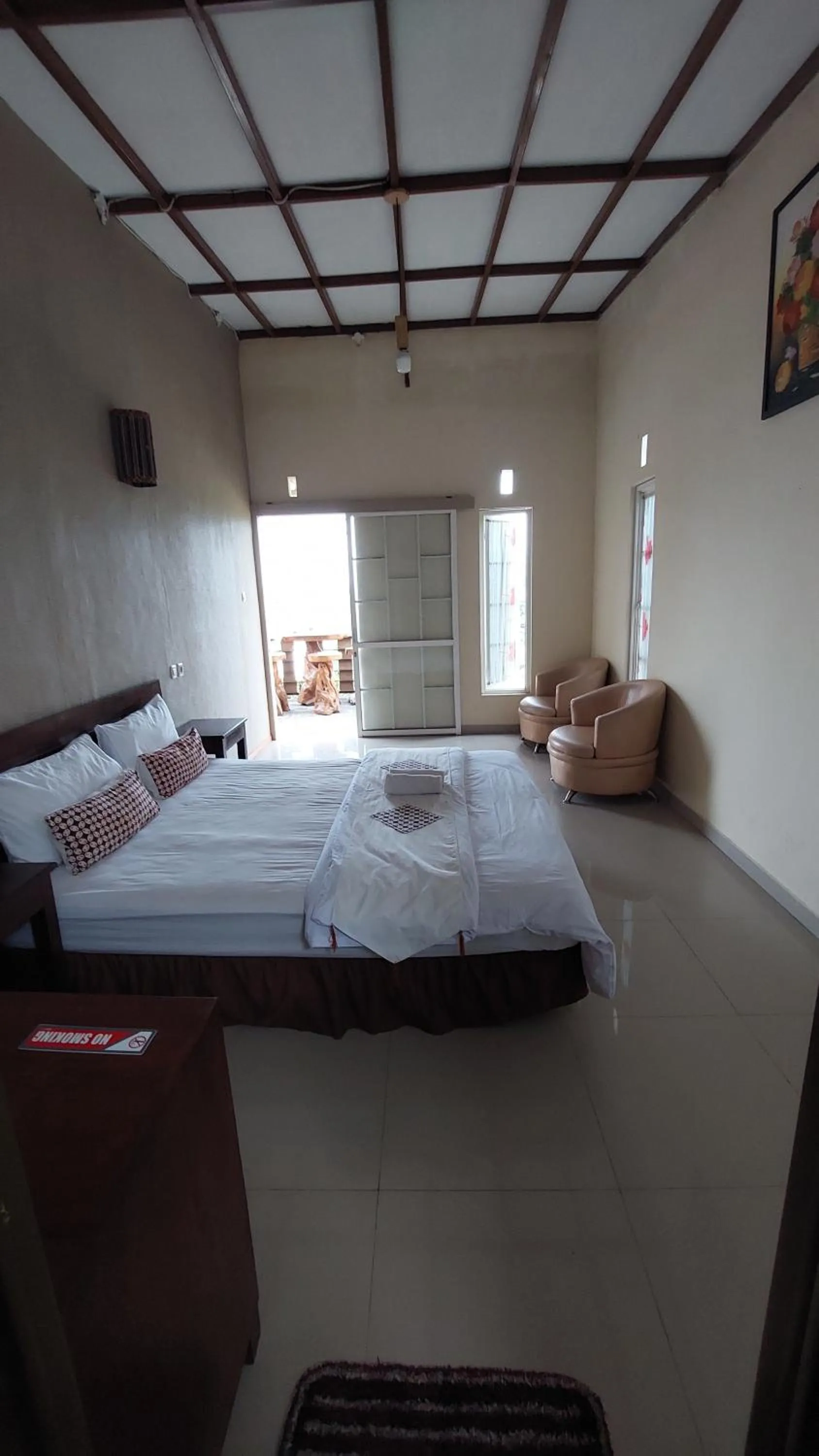 Bed in Bliss family cottage Batu