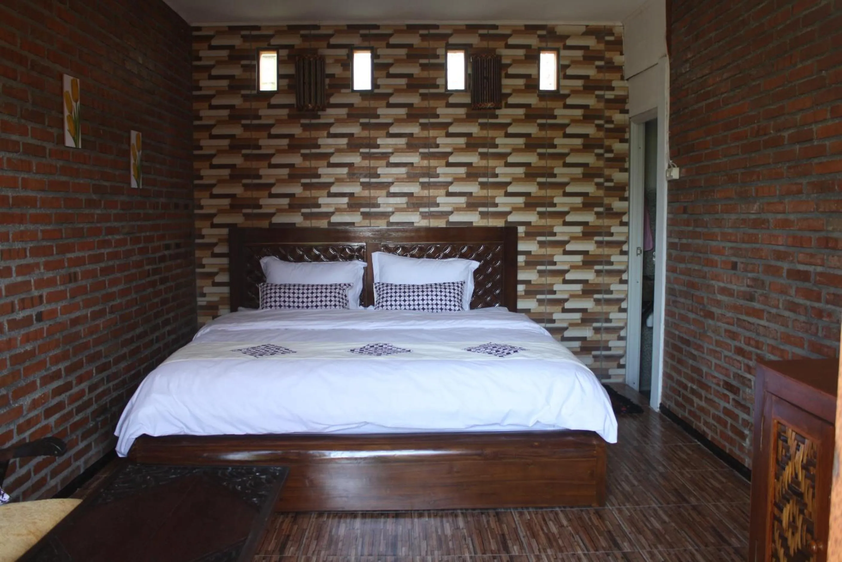 Bed in Bliss family cottage Batu