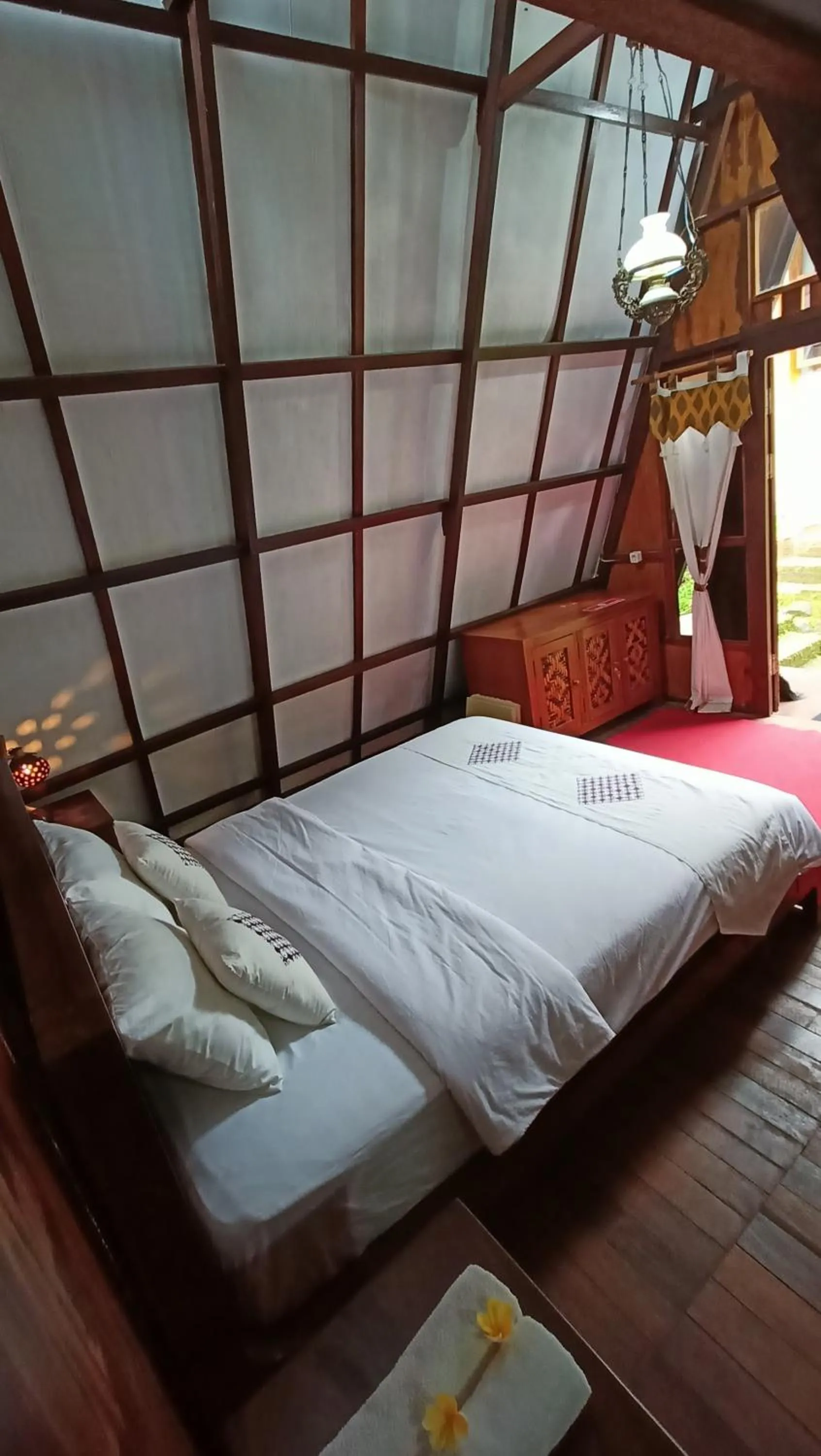 Bed in Bliss family cottage Batu