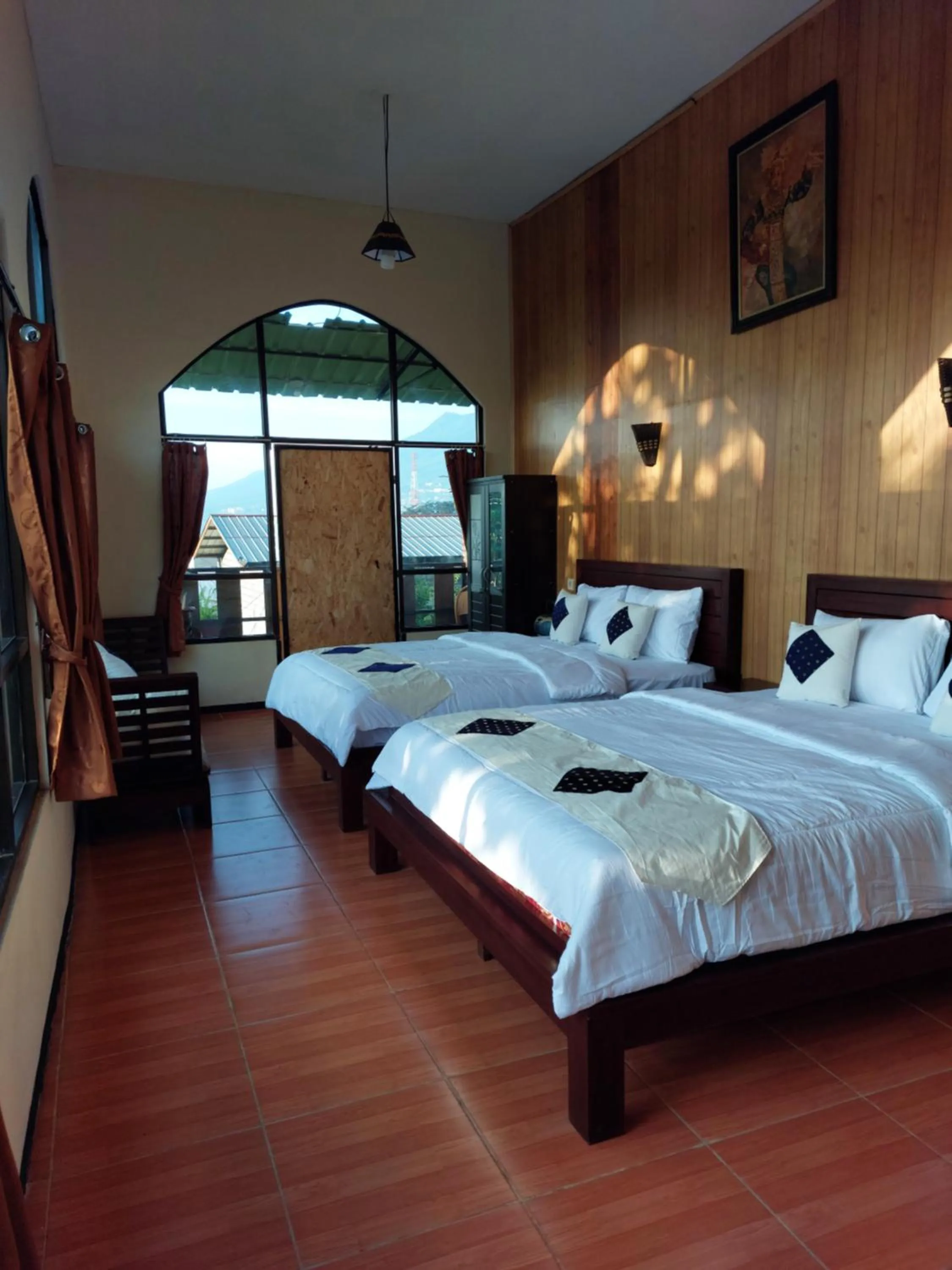 Bed in Bliss family cottage Batu