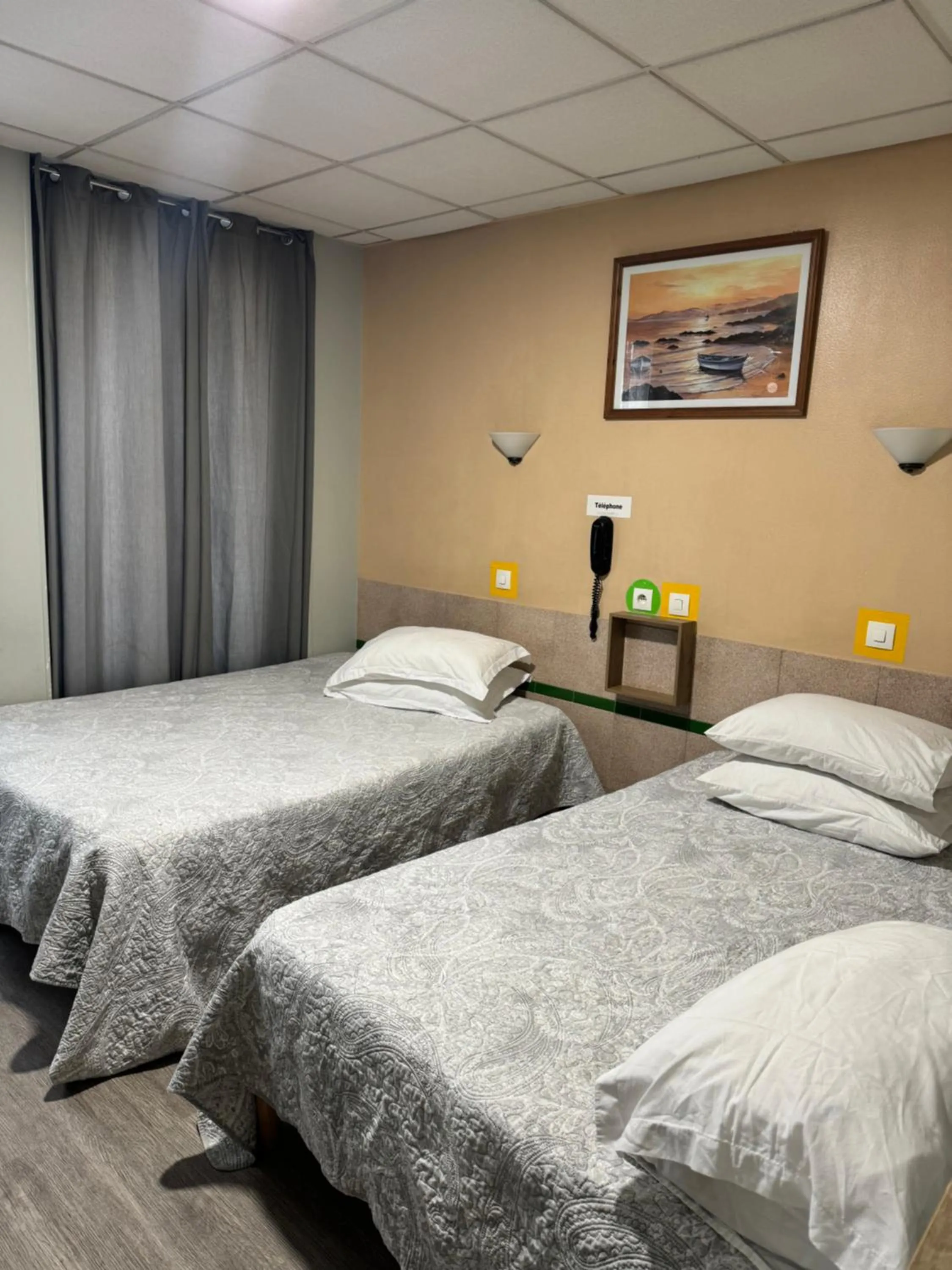 Bed in Hôtel Jarry Confort