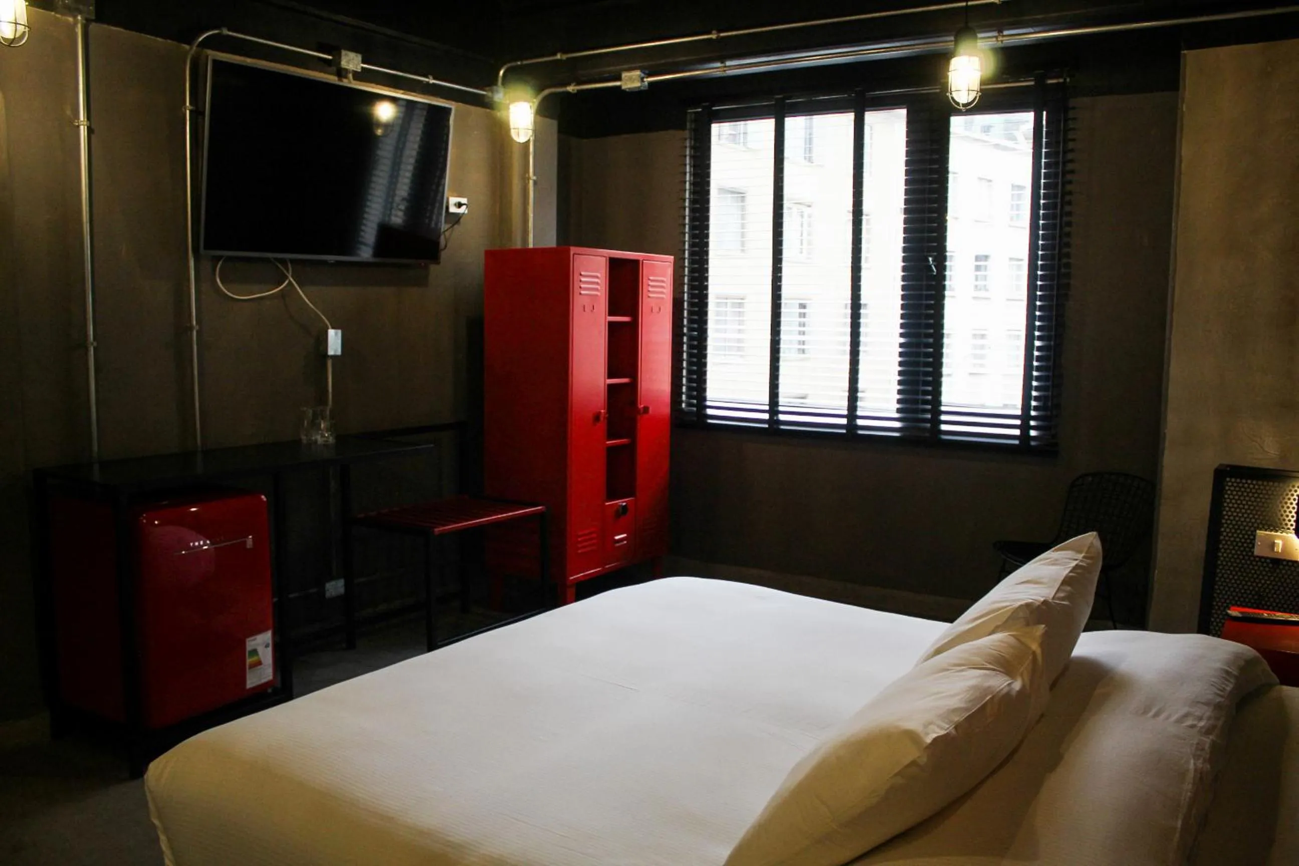 Bed in LOFT Hotel by Sommelier Hoteles
