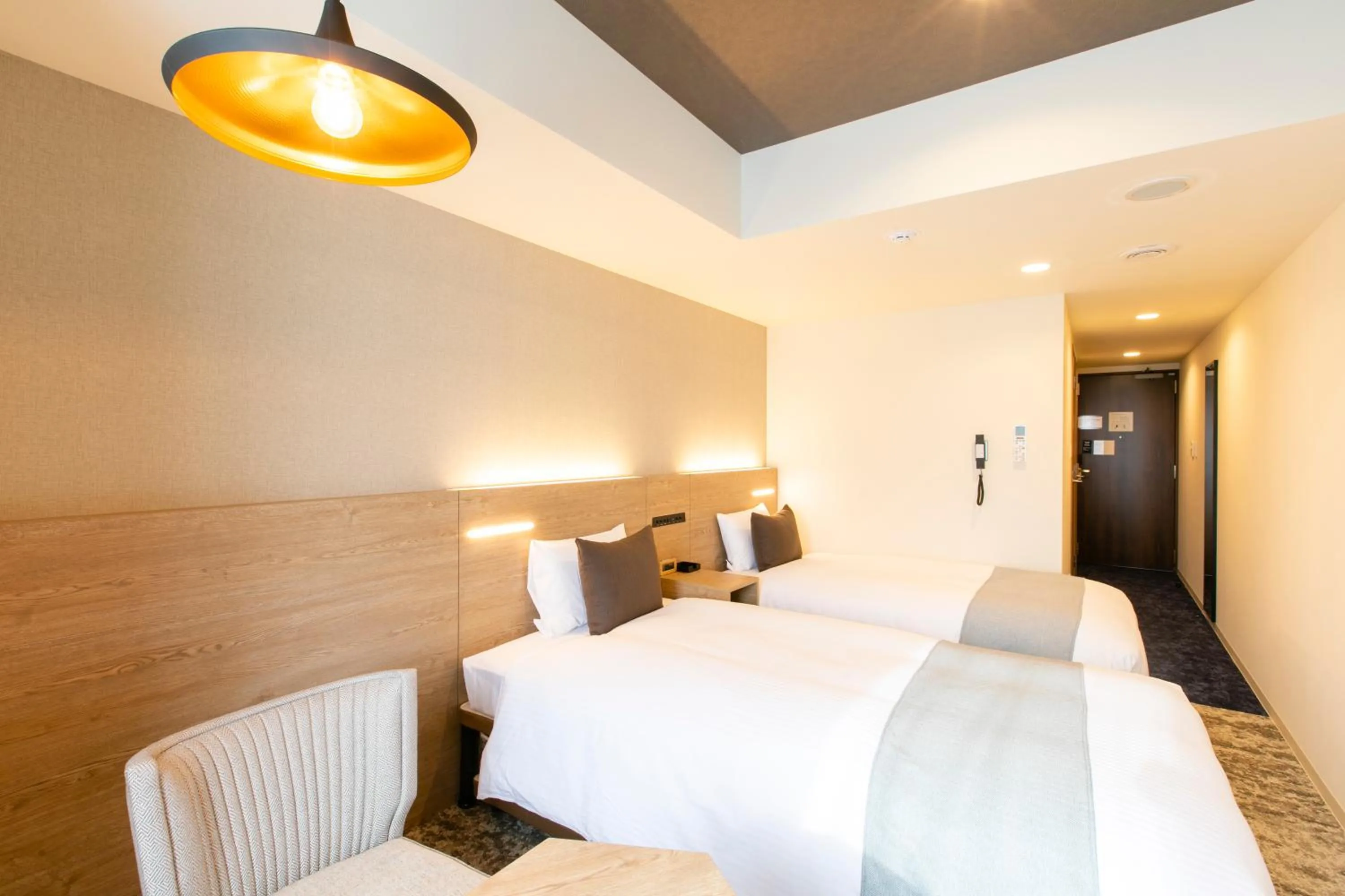 Photo of the whole room, Bed in KOKO HOTEL Sapporo Susukino - formerly Hotel Wing International Sapporo Susukino