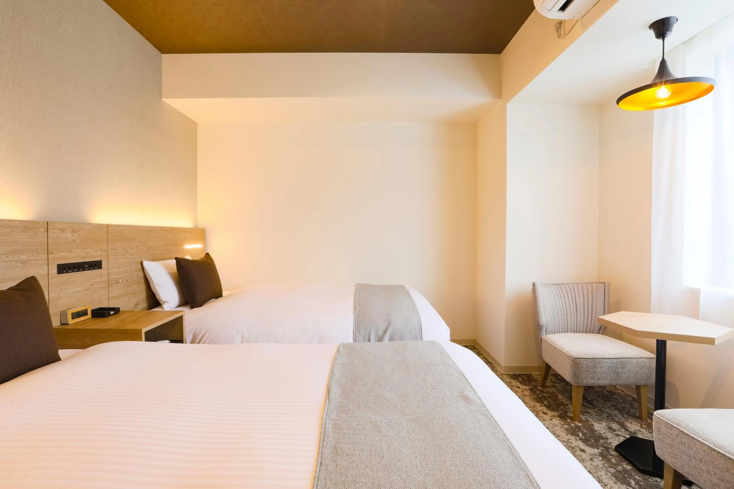 Photo of the whole room, Bed in KOKO HOTEL Sapporo Susukino - formerly Hotel Wing International Sapporo Susukino