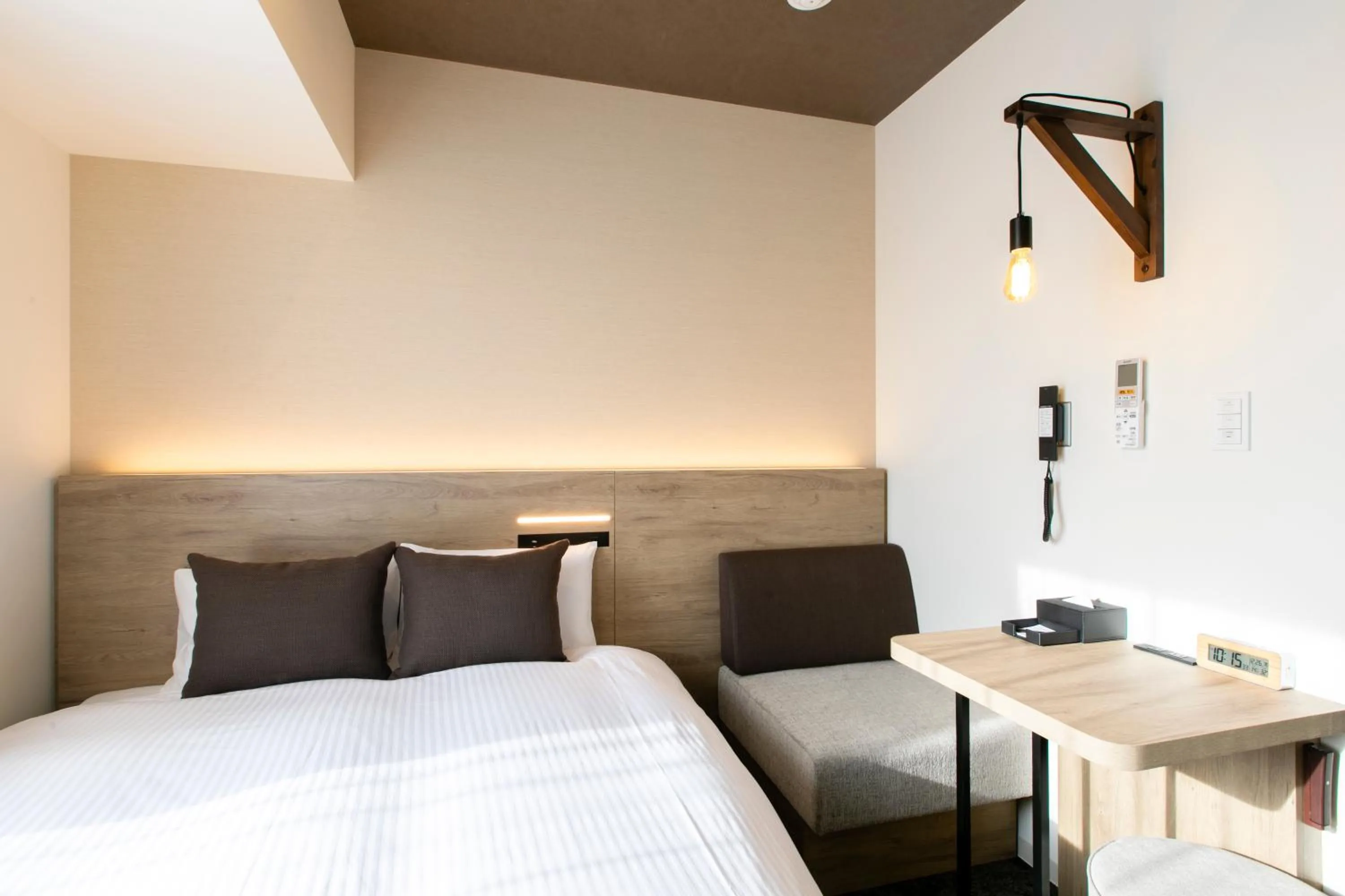 Photo of the whole room, Bed in KOKO HOTEL Sapporo Susukino - formerly Hotel Wing International Sapporo Susukino