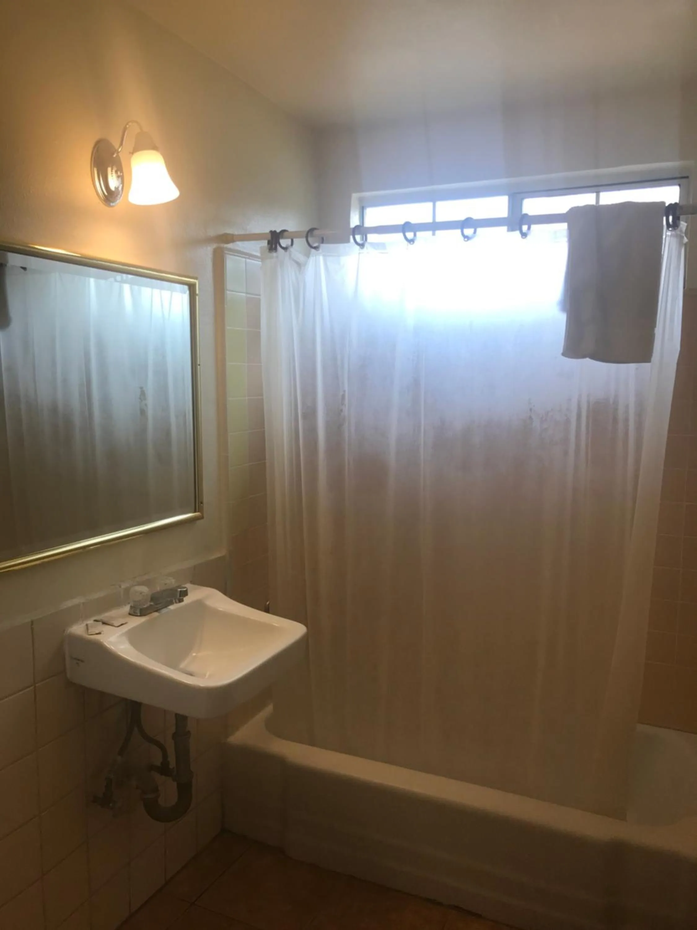 Shower in All 8 Motel