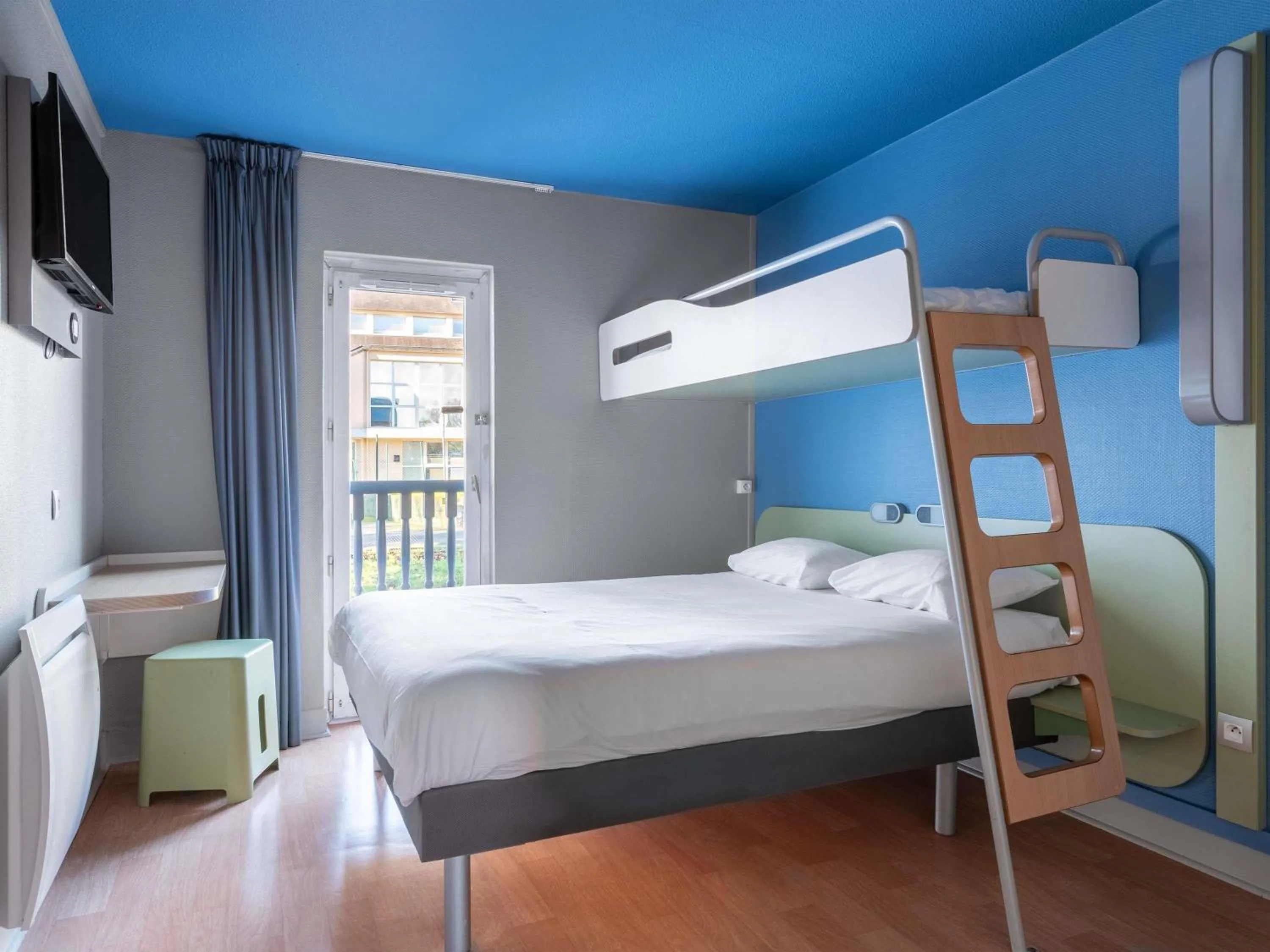 Triple Room with One Double Bed and One Bunk Bed in ibis budget Caen Hérouville