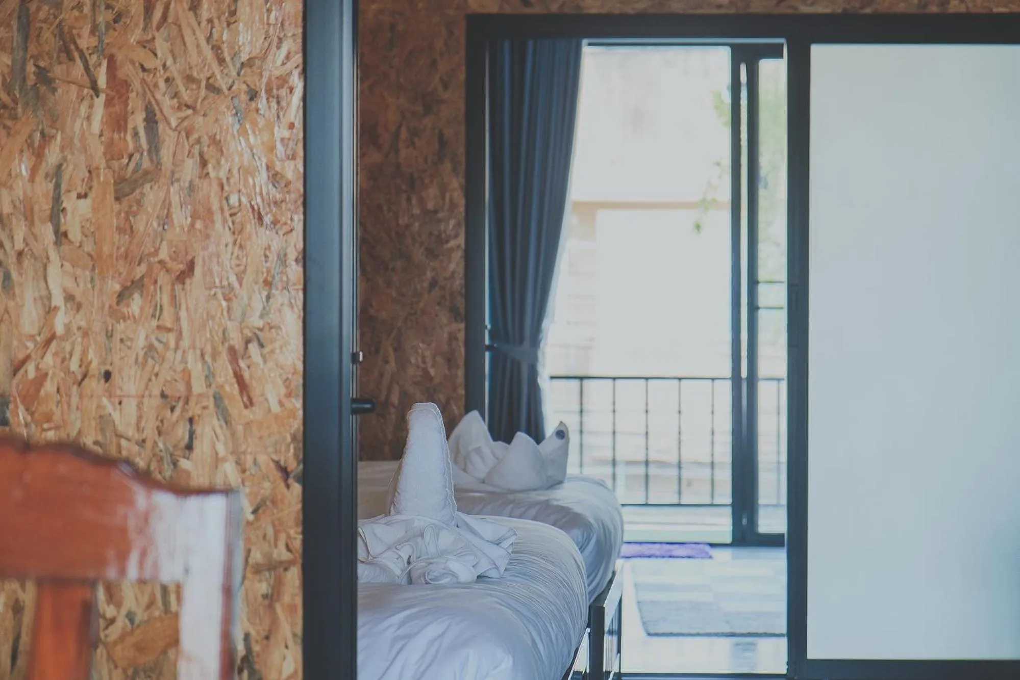 Bed, Seating Area in Chill Vibe Hostel