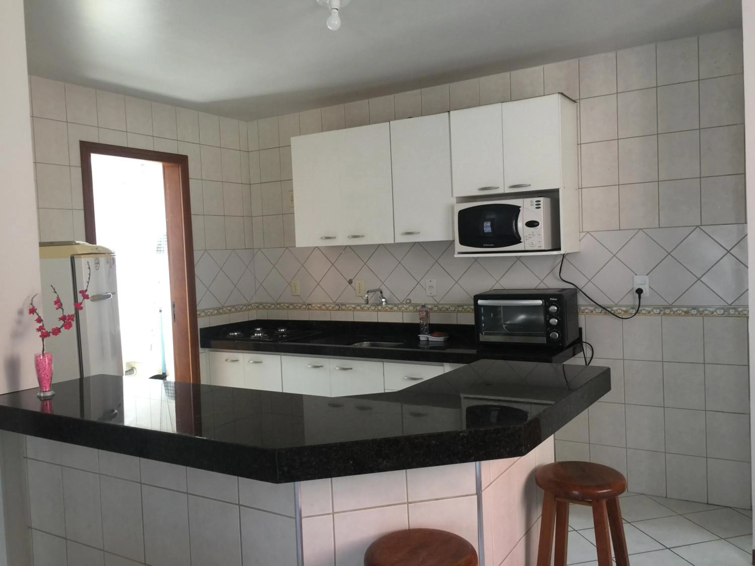 Communal kitchen in Kasato Maru Residence