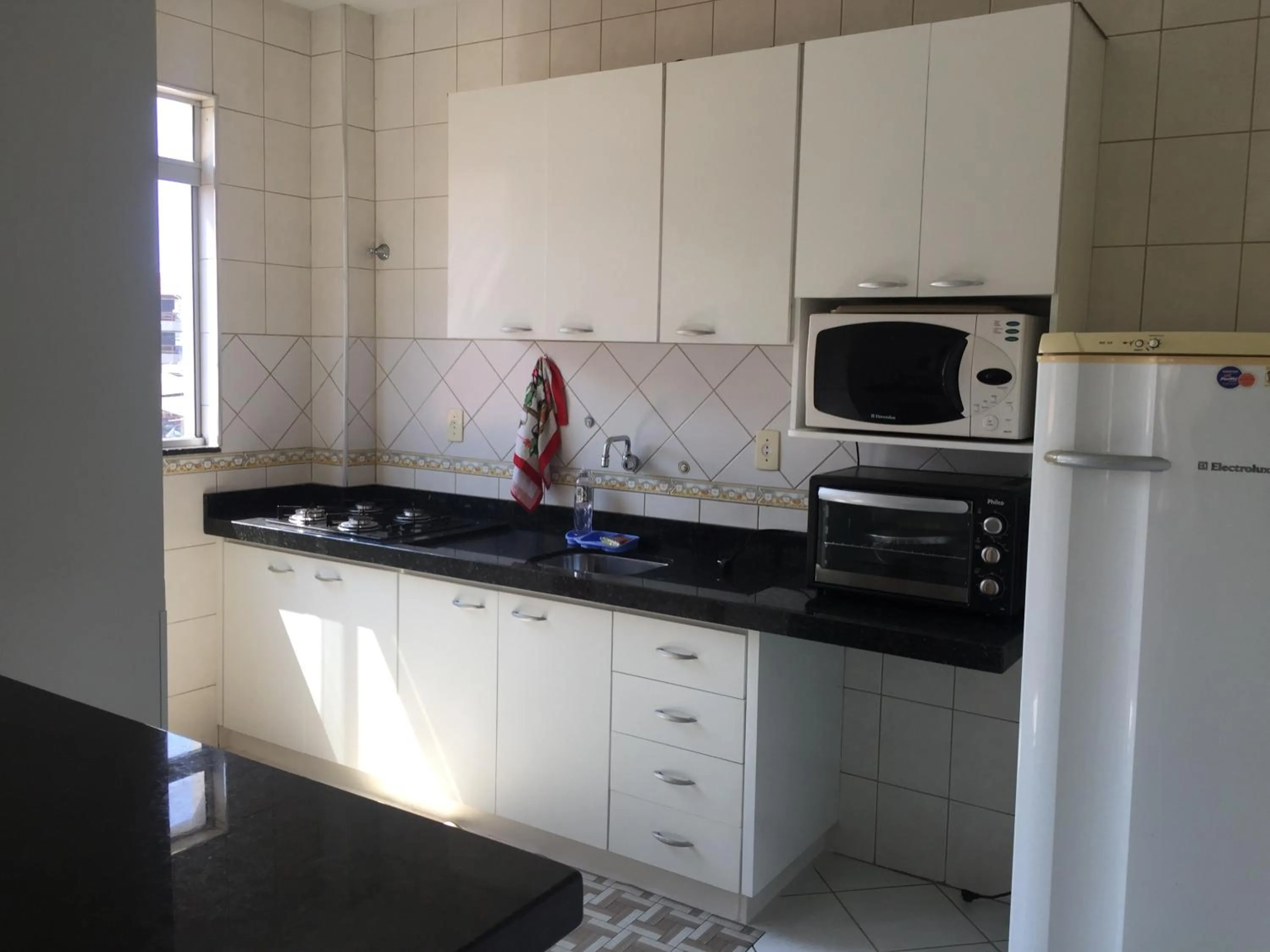Communal kitchen in Kasato Maru Residence
