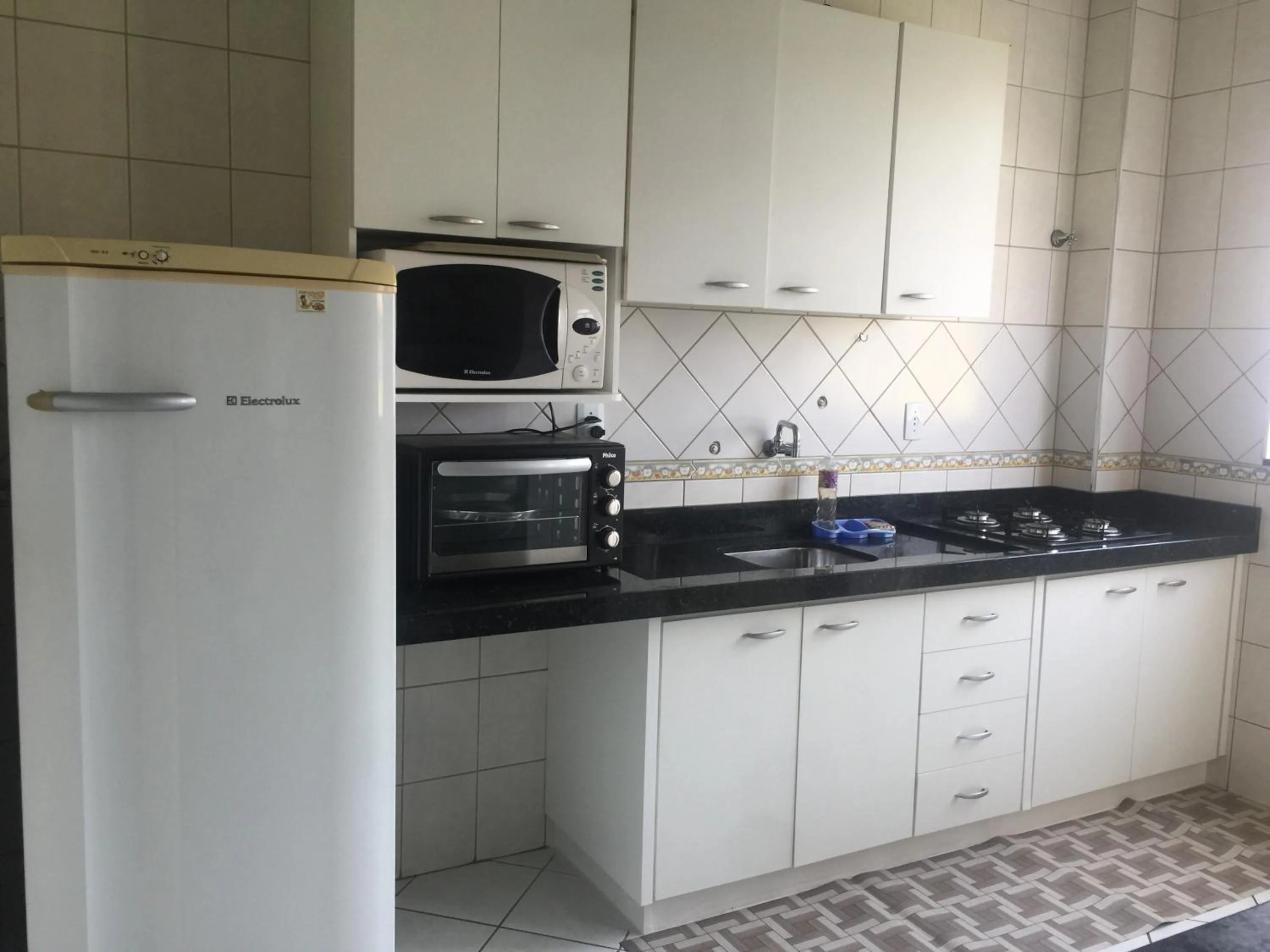 Communal kitchen in Kasato Maru Residence