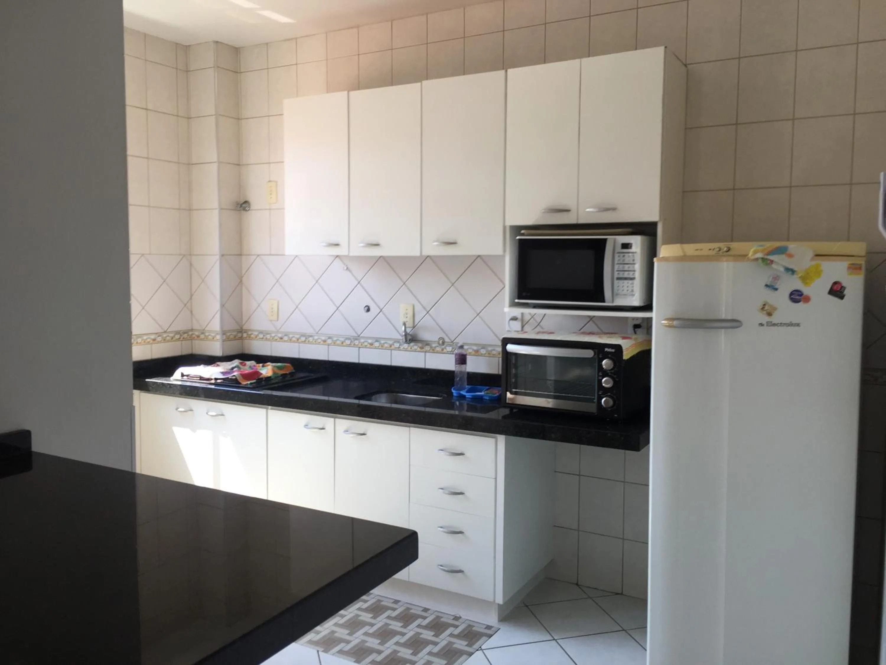 Communal kitchen in Kasato Maru Residence