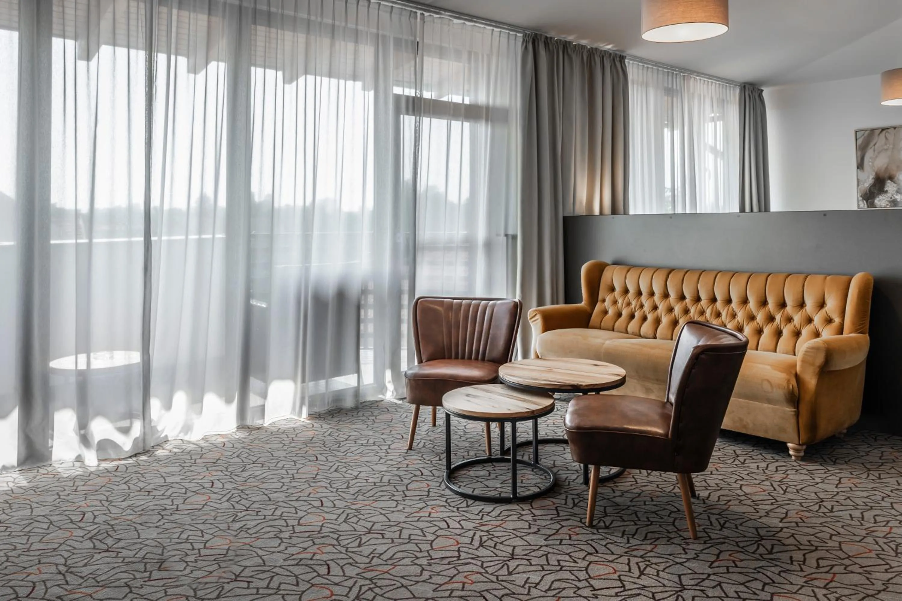 Seating area in Charm Boutique Hotel