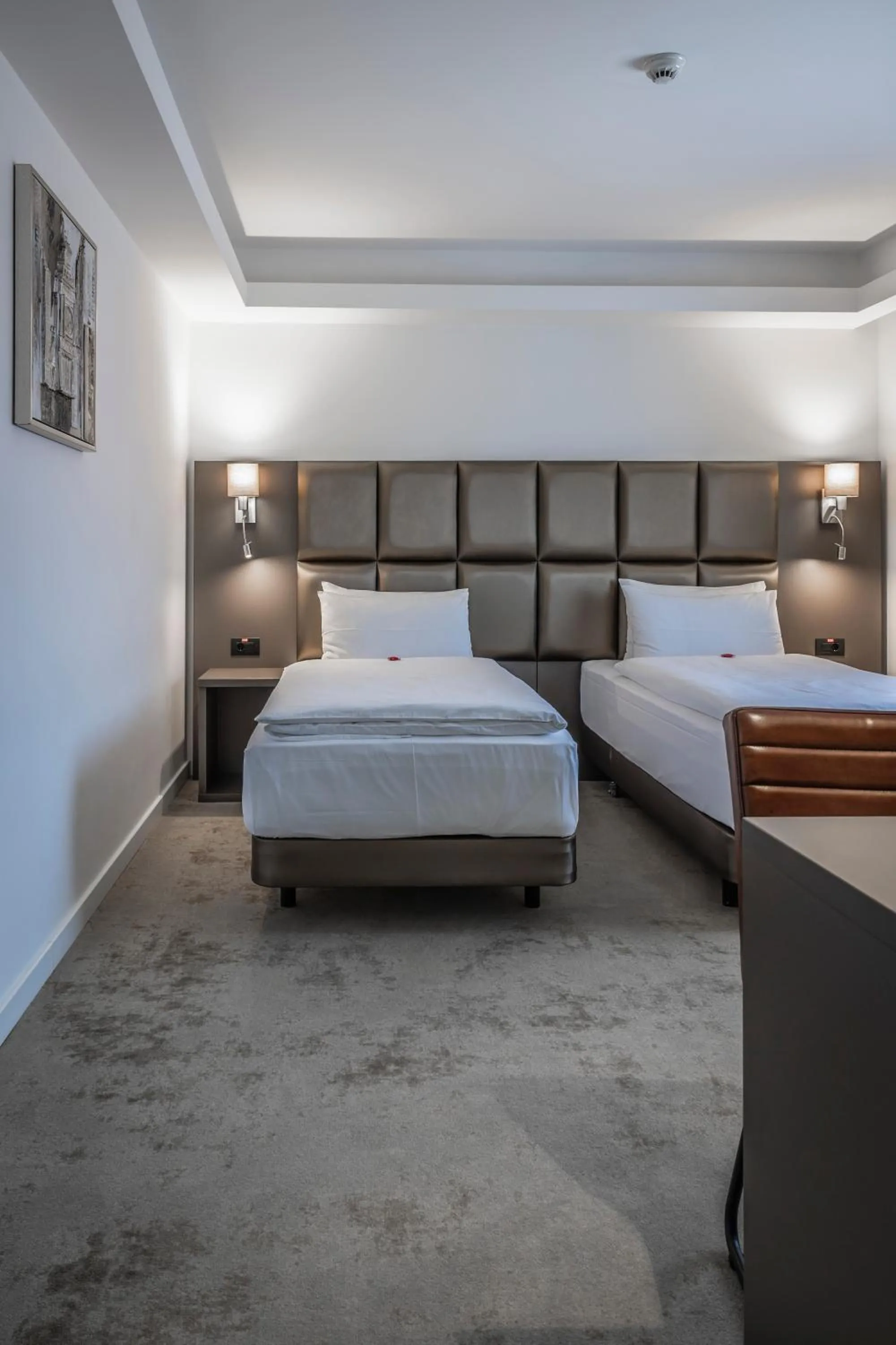 Bed in Charm Boutique Hotel