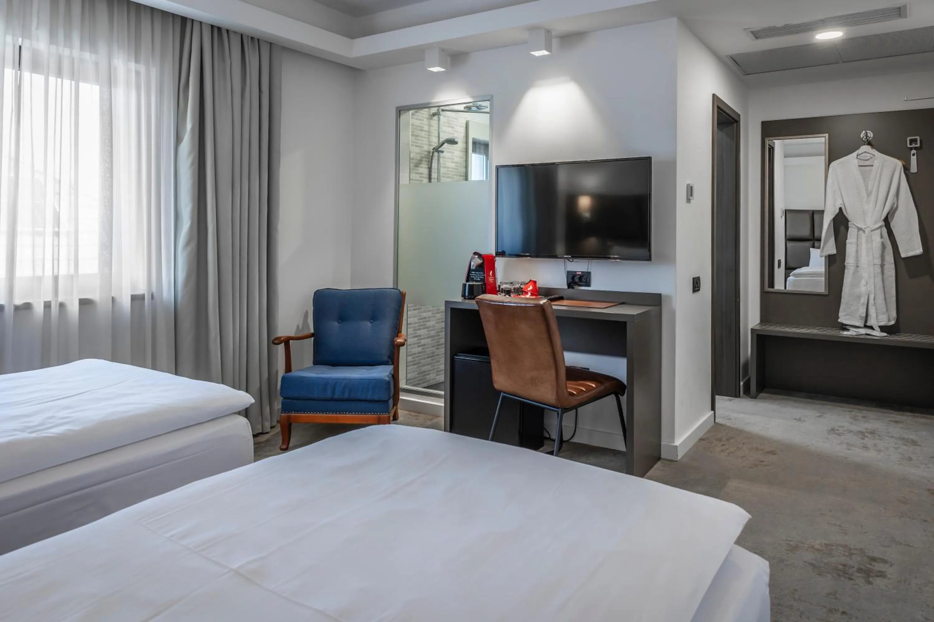 Photo of the whole room, Bed in Charm Boutique Hotel