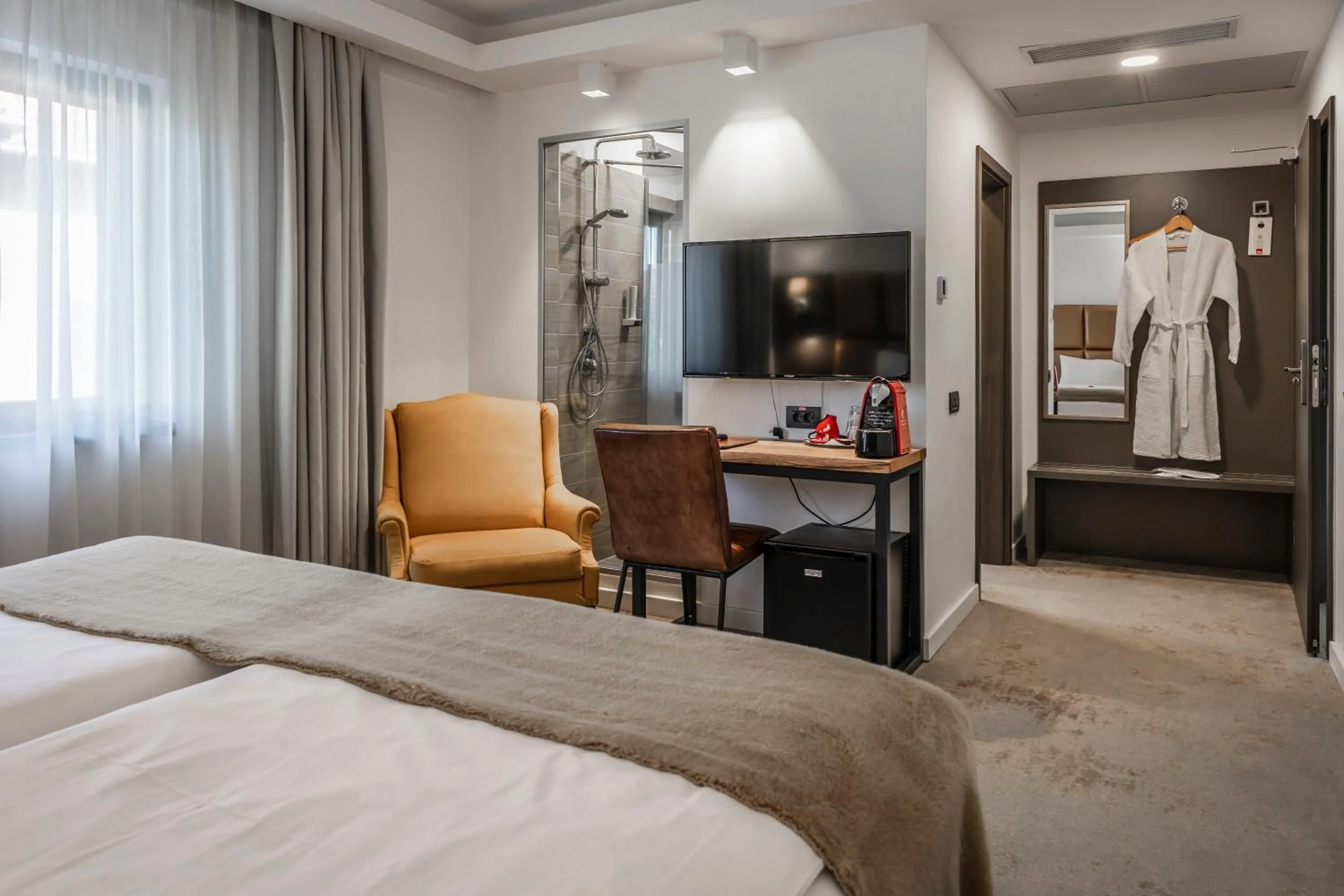 Photo of the whole room, Bed in Charm Boutique Hotel