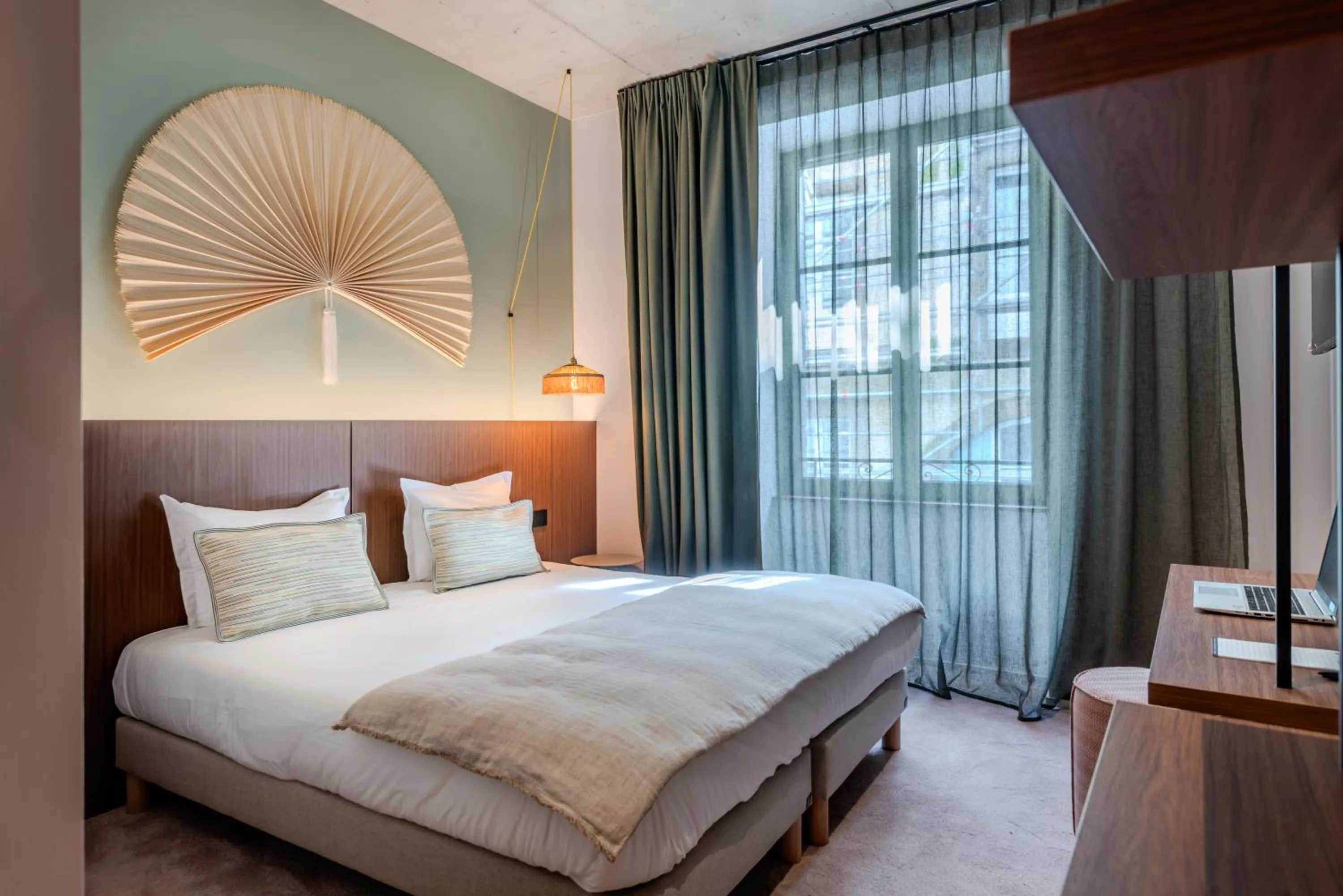 Bed in Hôtel Anne de Bretagne