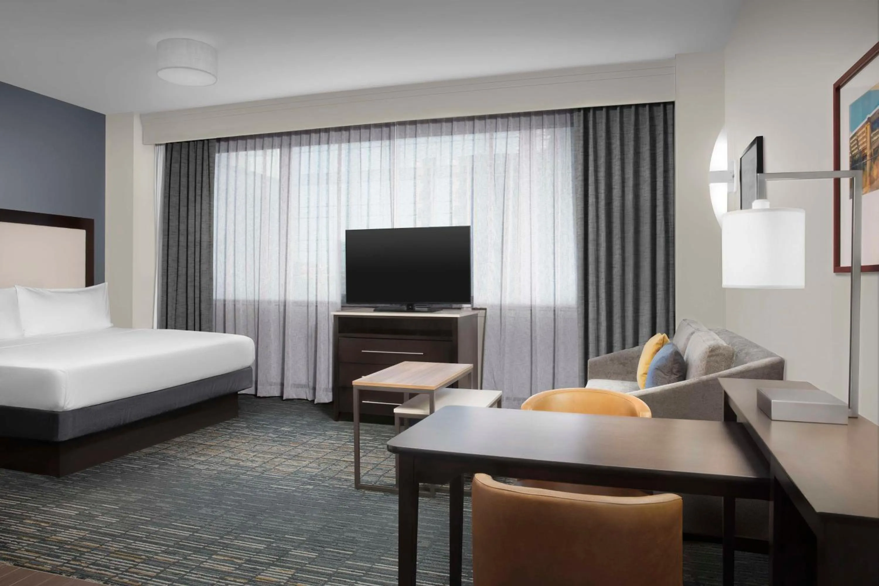 Living room, Bed in Homewood Suites Dallas Downtown