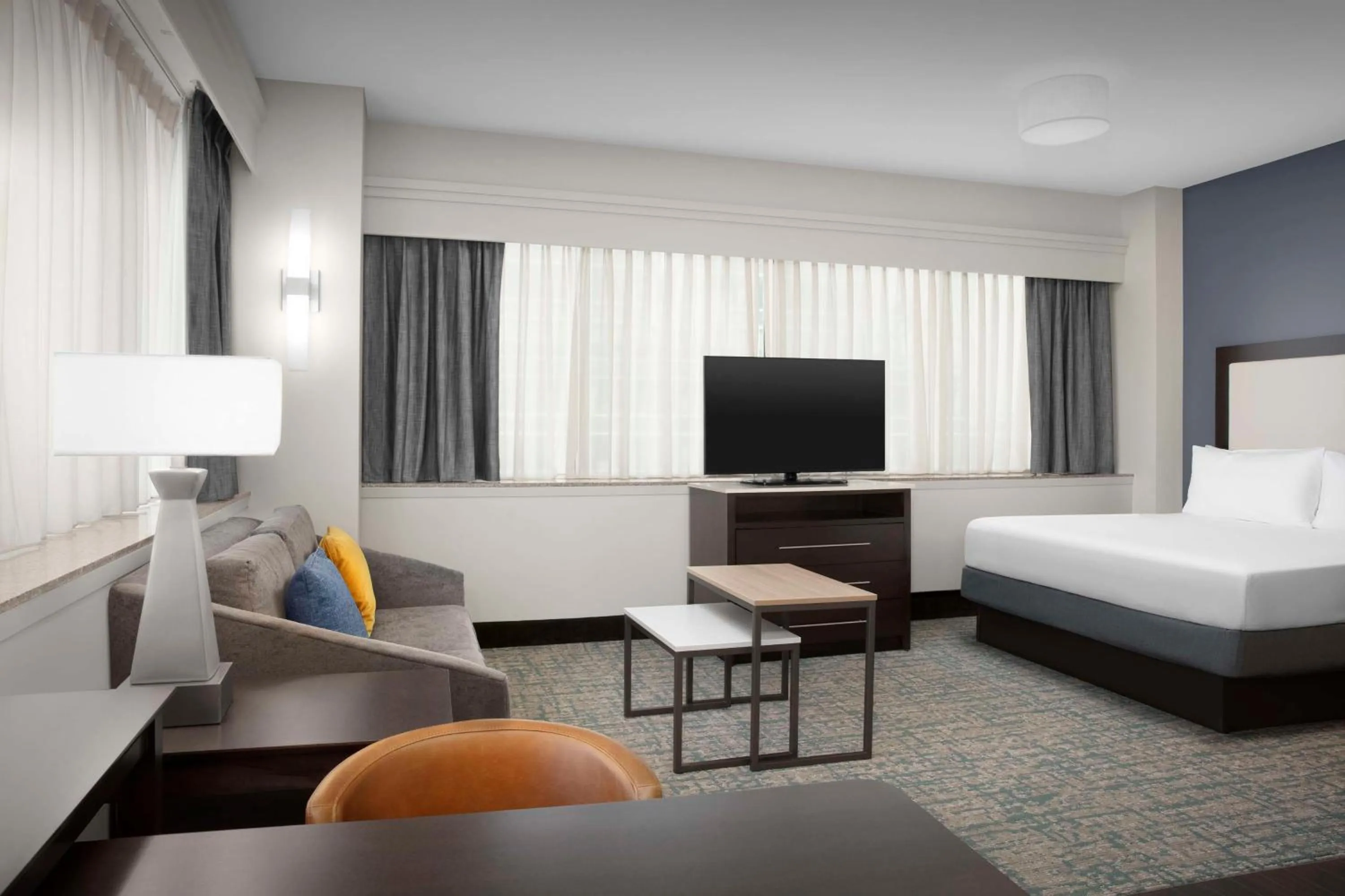 Living room, Bed in Homewood Suites Dallas Downtown