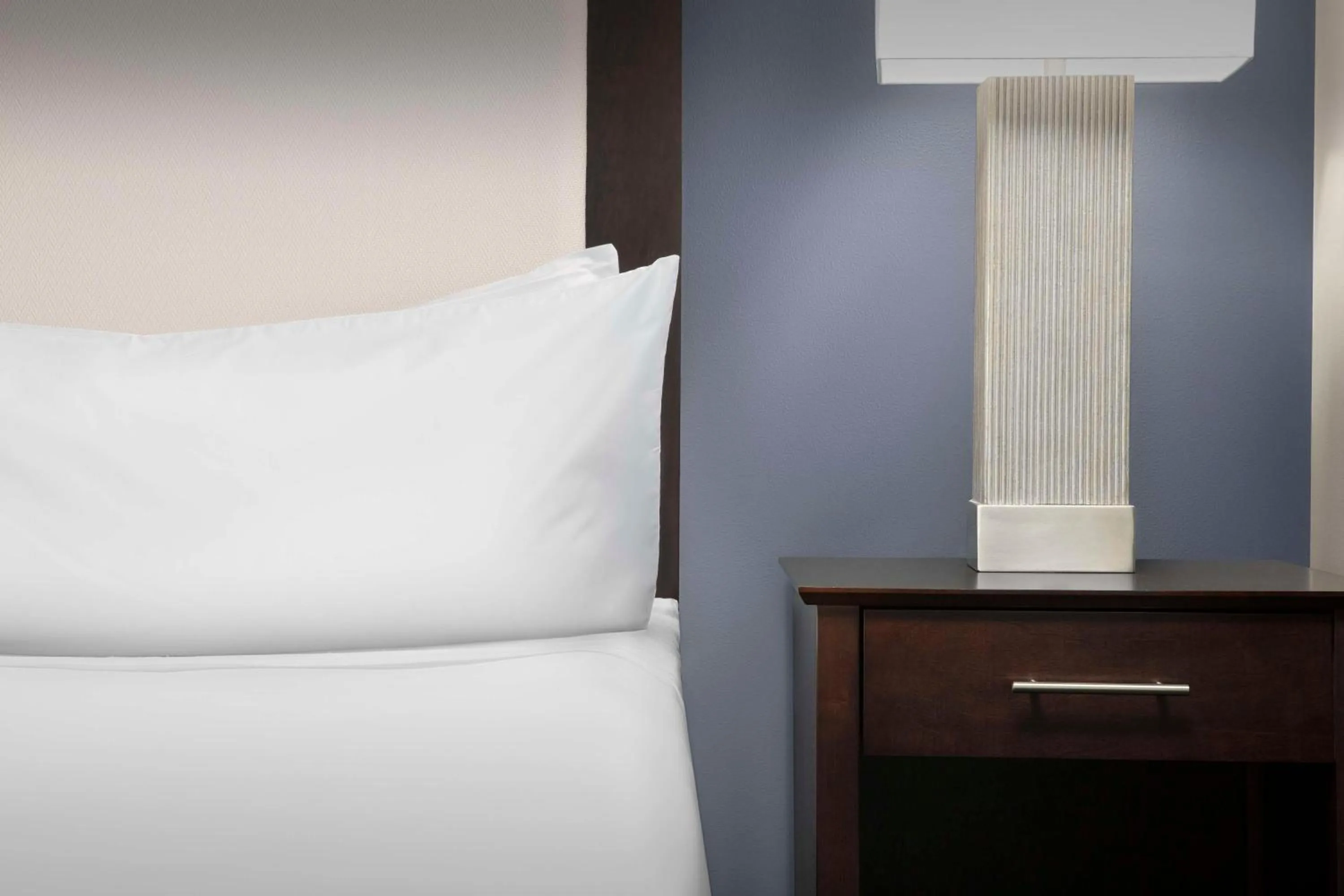 Bed in Homewood Suites Dallas Downtown