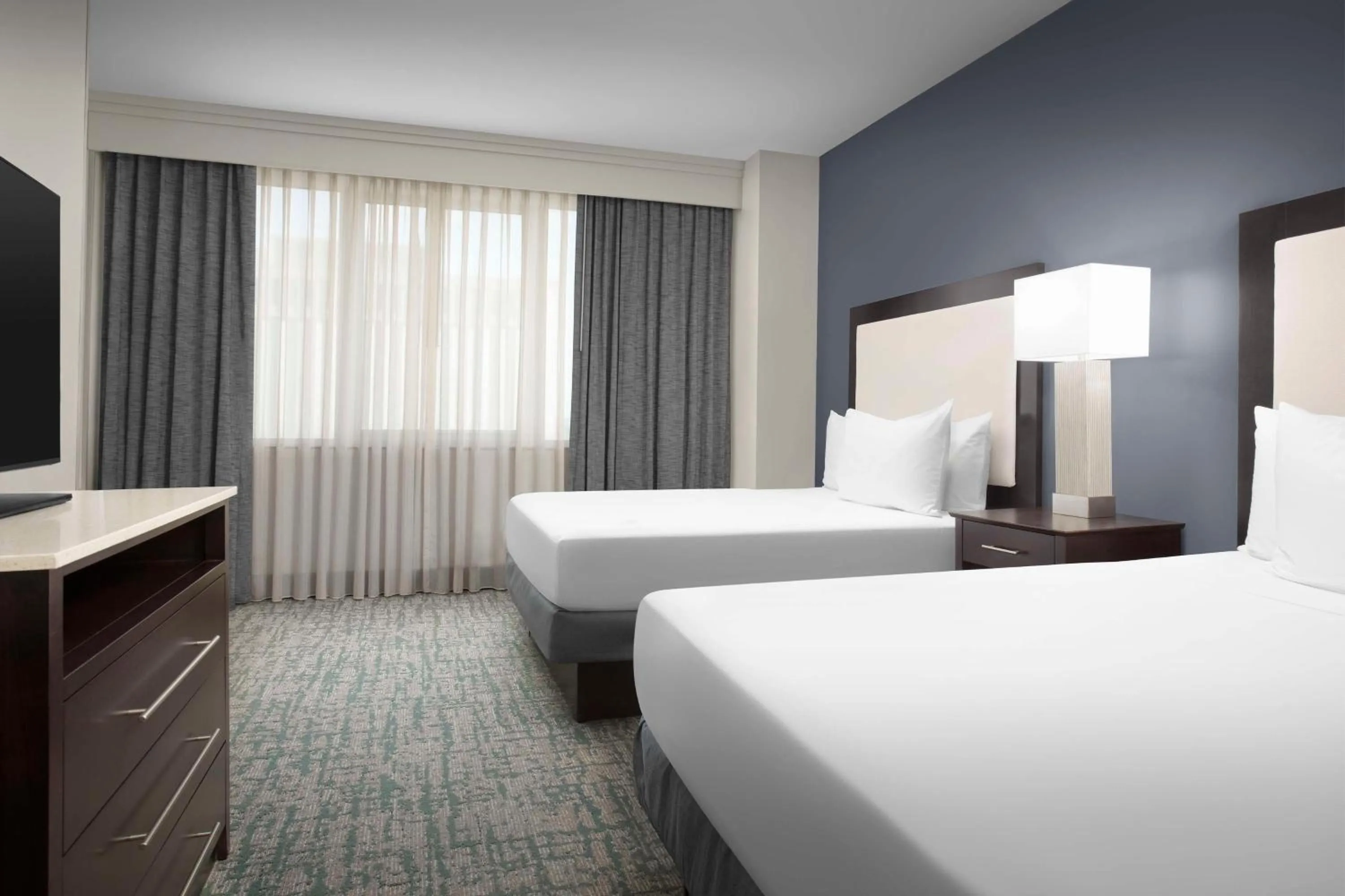 Bed in Homewood Suites Dallas Downtown