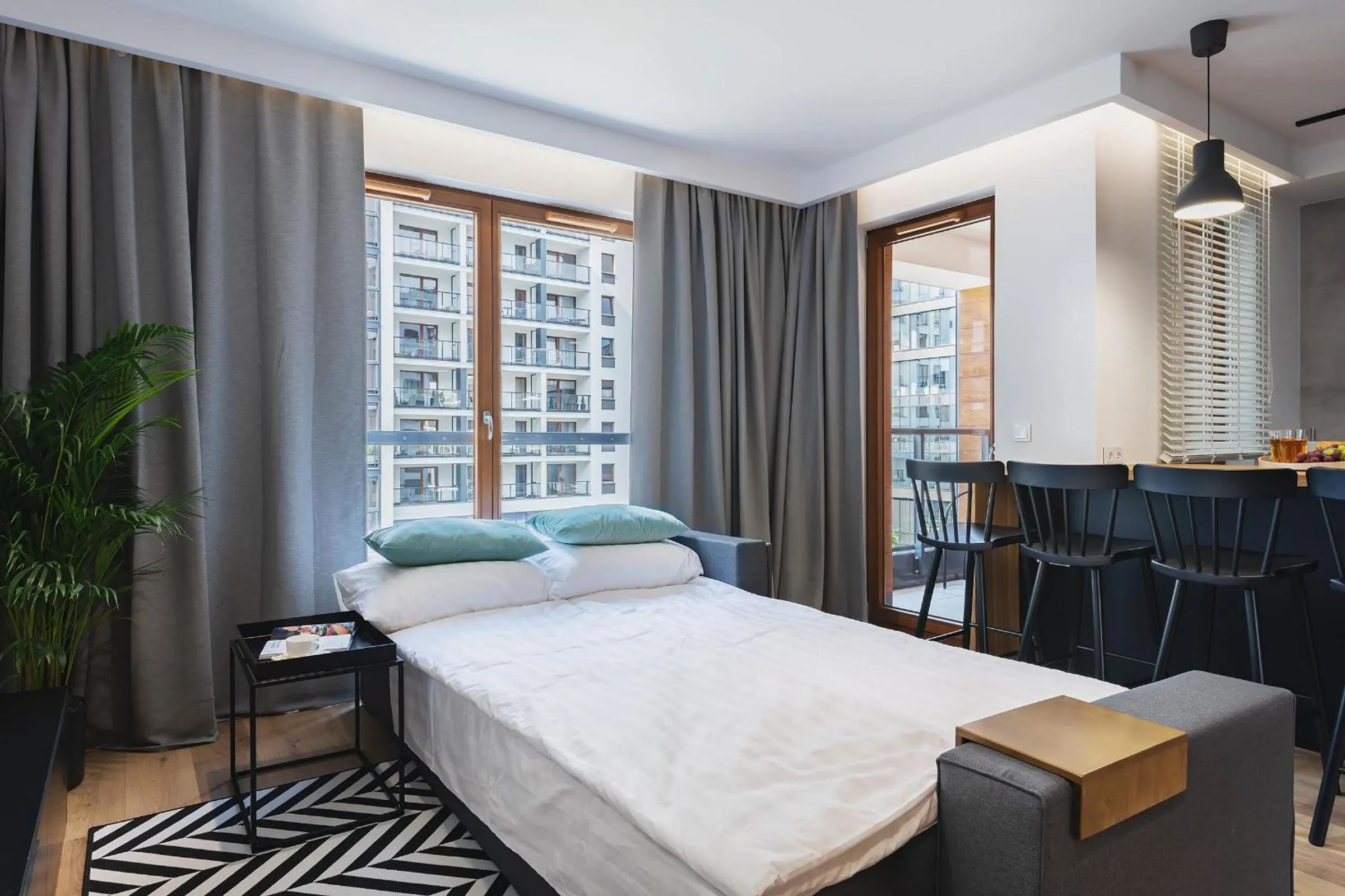 Bed in YourSecondFlat Grzybowska