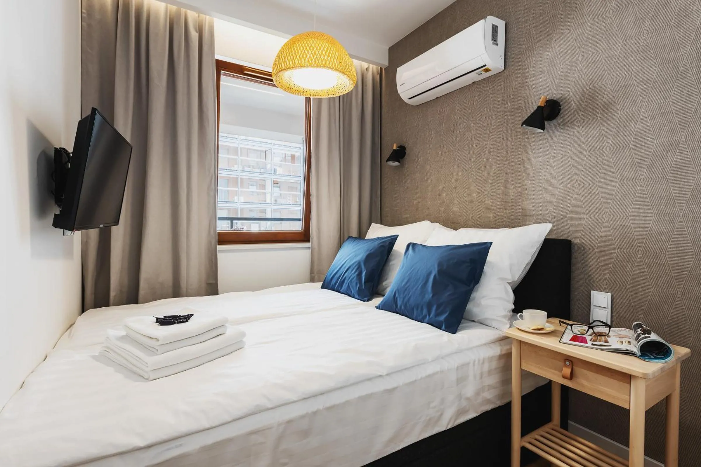 Bed in YourSecondFlat Grzybowska