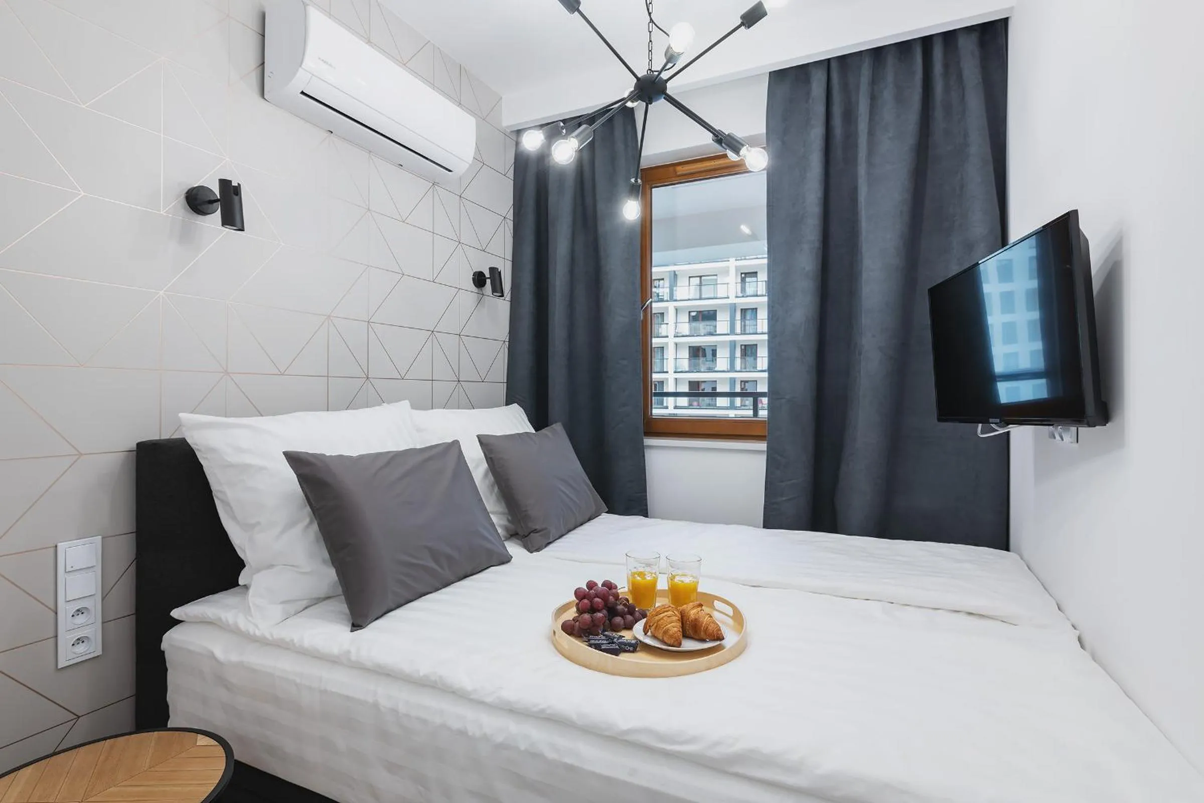 Bed in YourSecondFlat Grzybowska