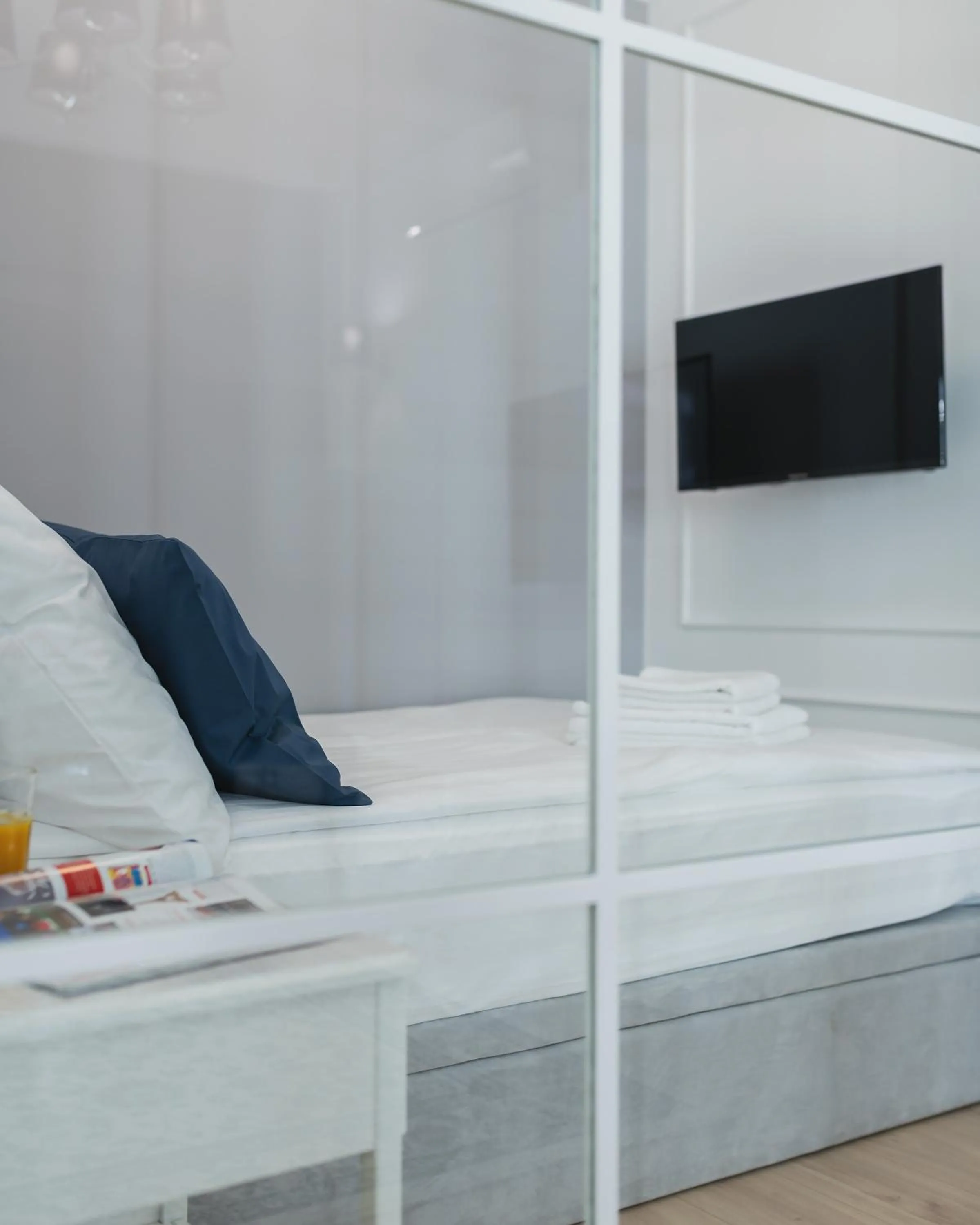 Bed in YourSecondFlat Grzybowska