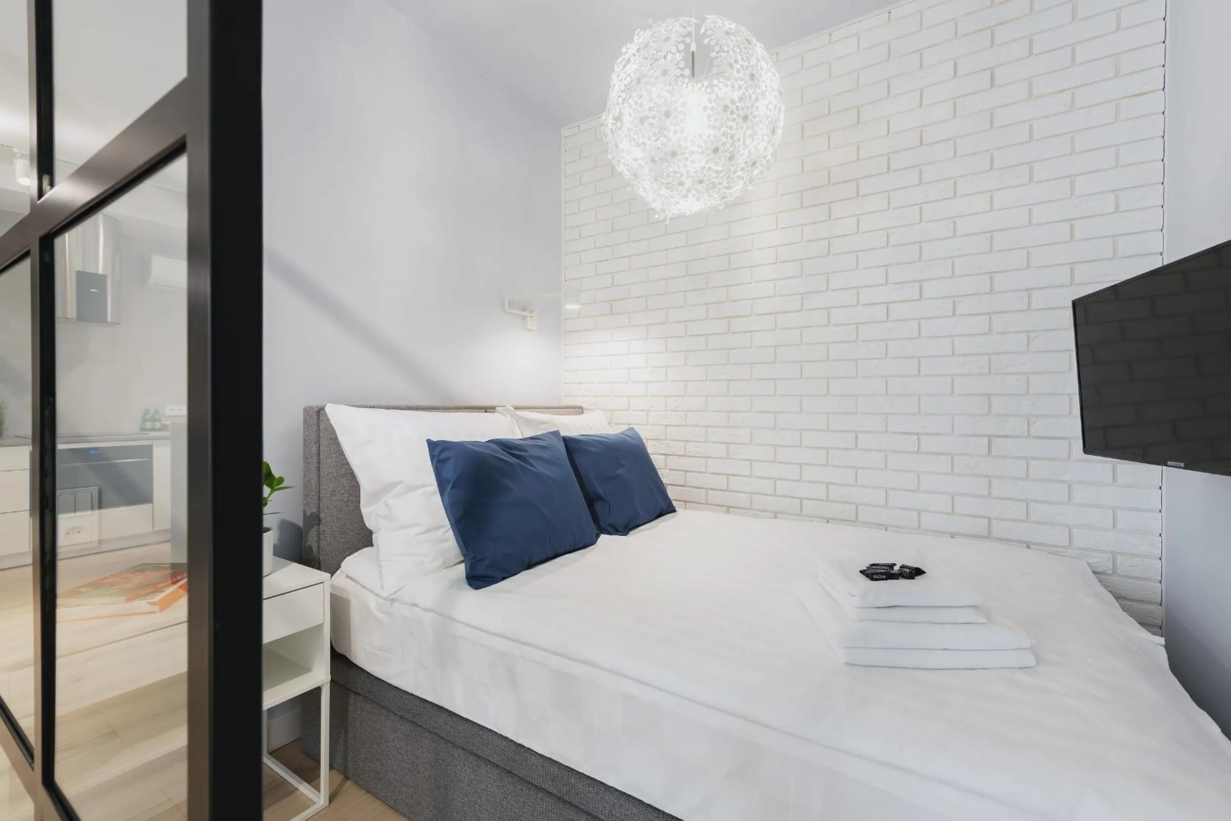 Bed in YourSecondFlat Grzybowska