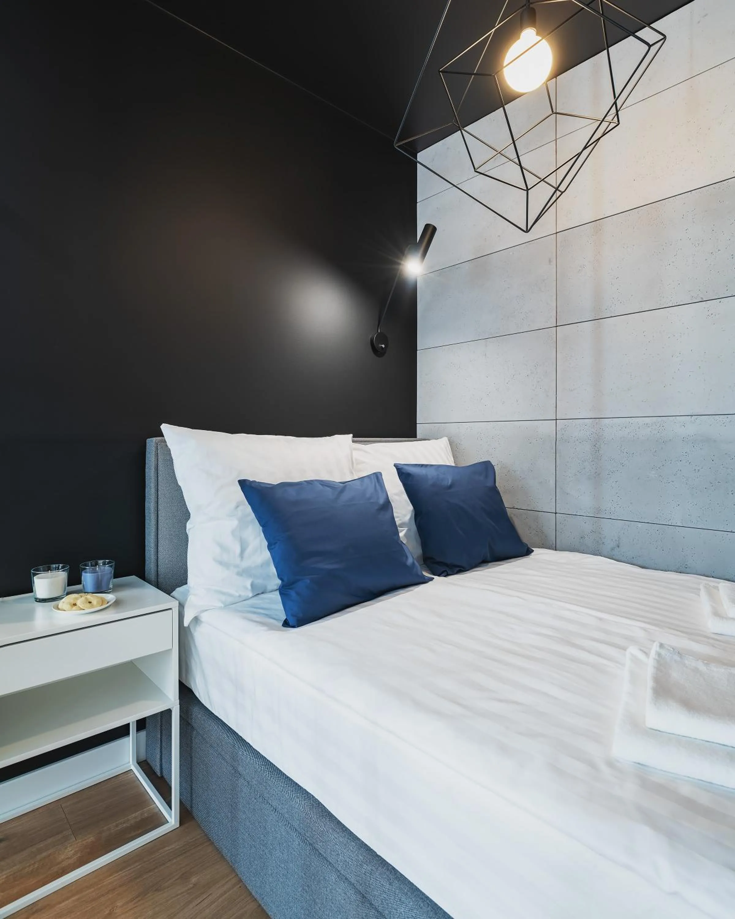 Bed in YourSecondFlat Grzybowska