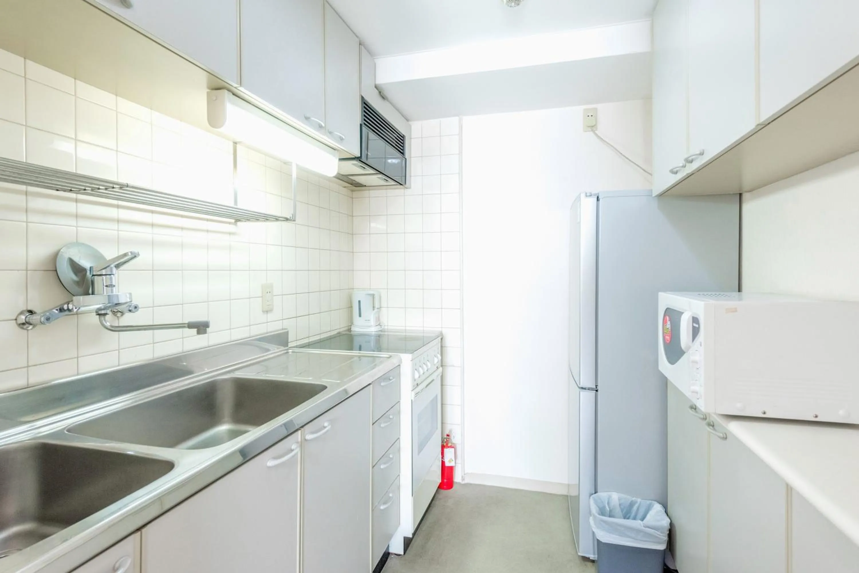 Kitchen or kitchenette in Ruishi Hotel Dalian