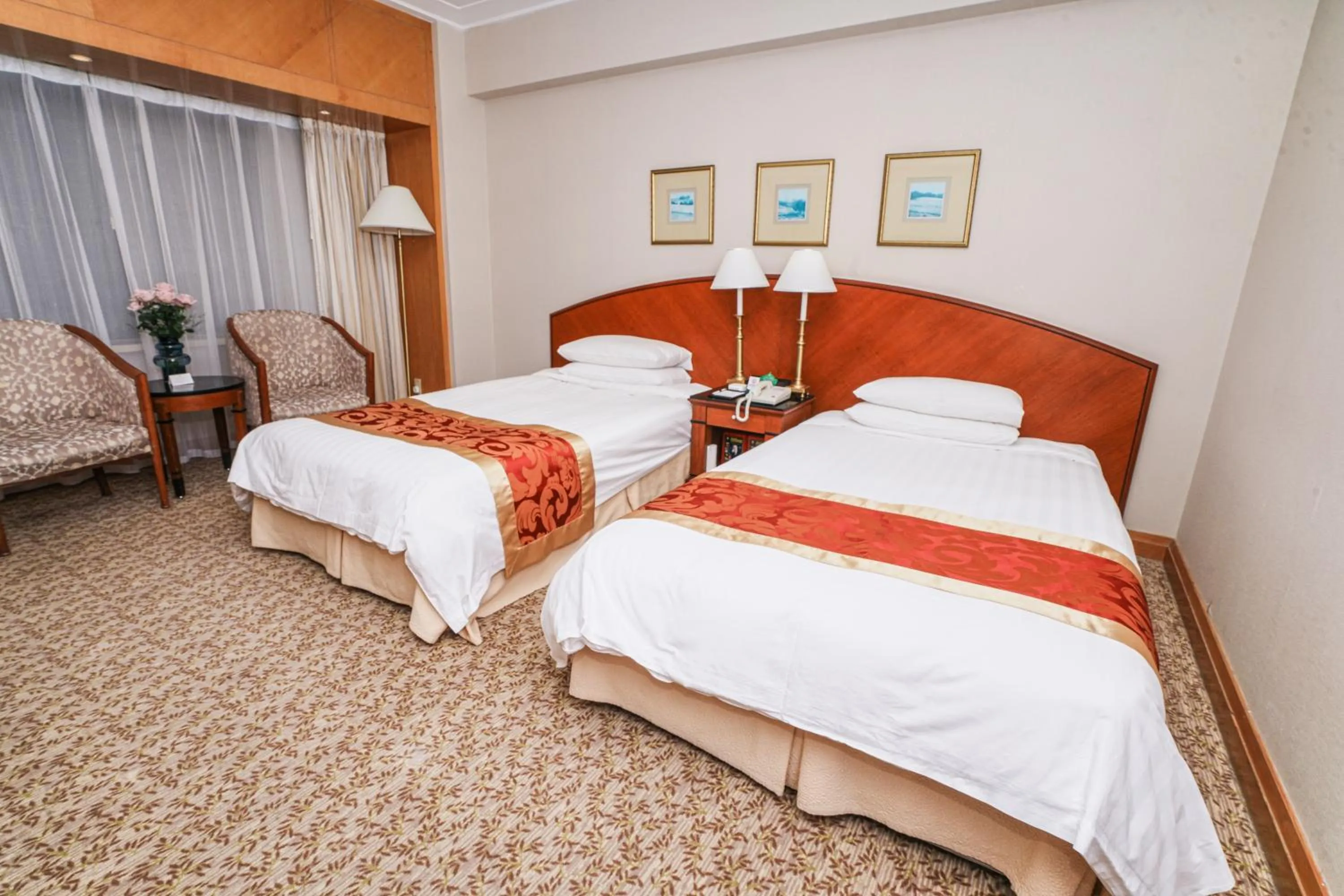 Bed in Ruishi Hotel Dalian