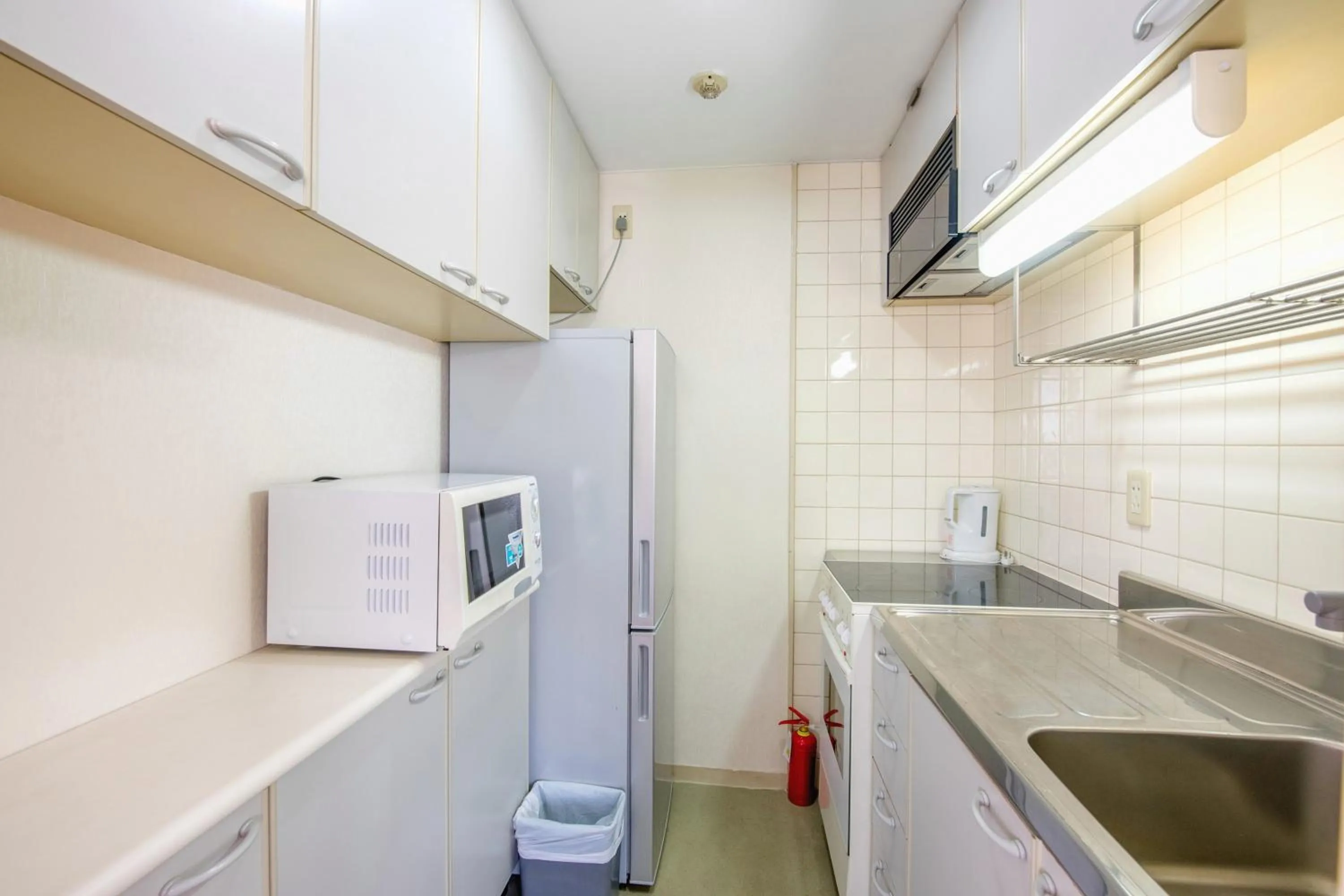 Kitchen or kitchenette in Ruishi Hotel Dalian