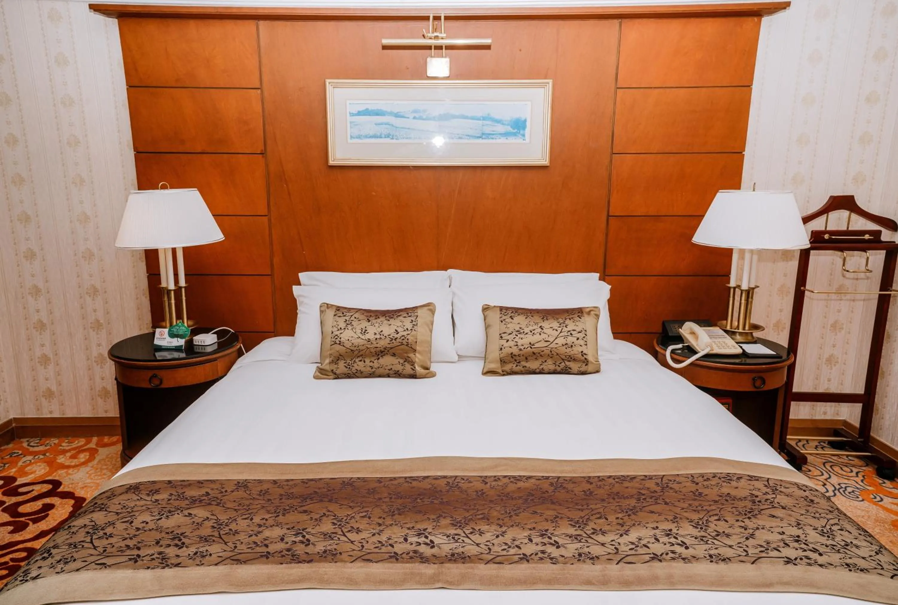 Bed in Ruishi Hotel Dalian